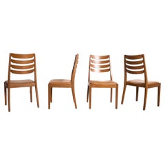 Used 4 mid century teak dining chairs