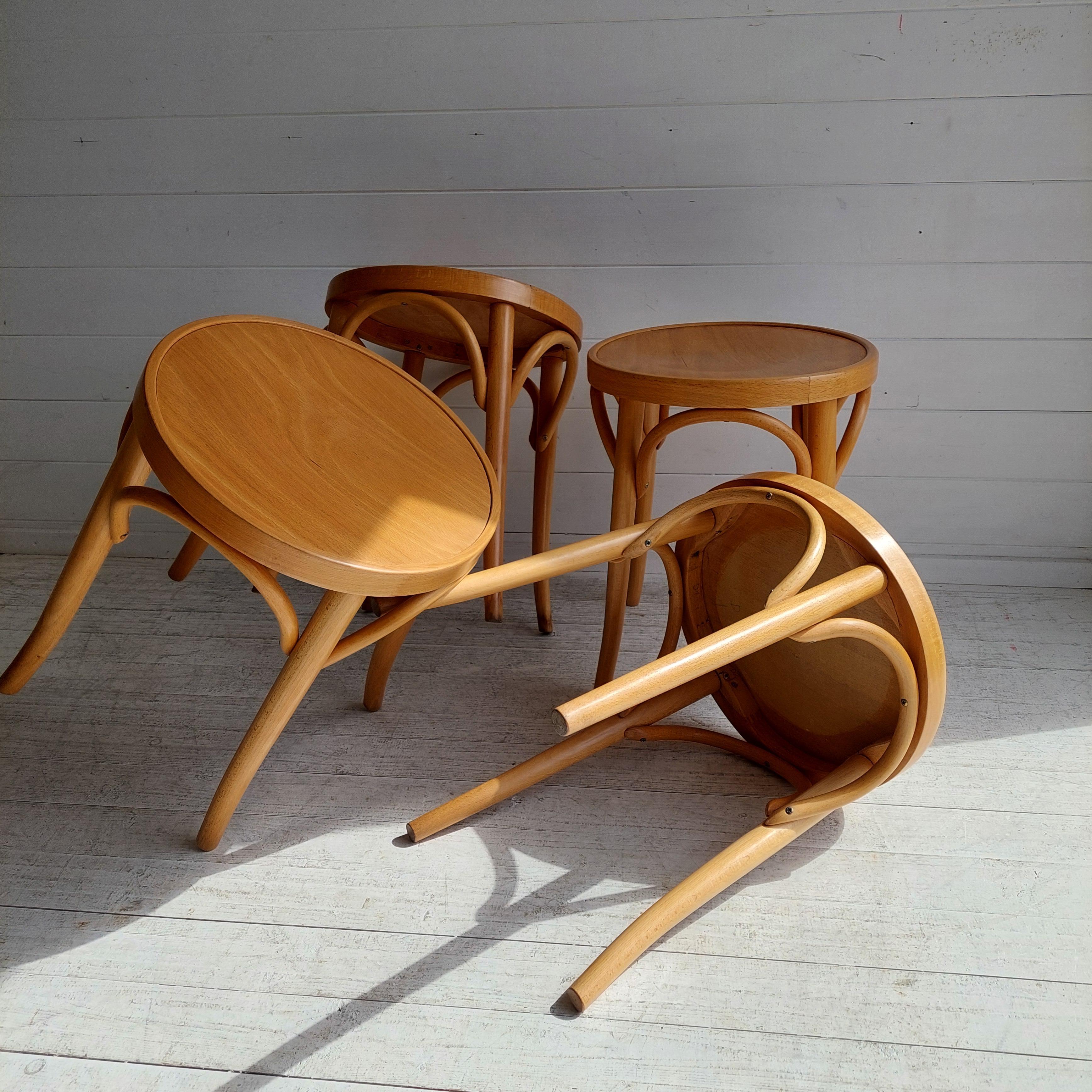 4 Thonet Style bentwood stools, (model 60). 1960s
No 60 from Ton is a lower variant of the classical barstool No. 73.
Its simple look lets the four manually bent pieces of beech wood stand out as they create the connection between the leg and