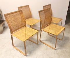 Pair Modern Tropical Woven Cane Chairs with Removable Leather Seats