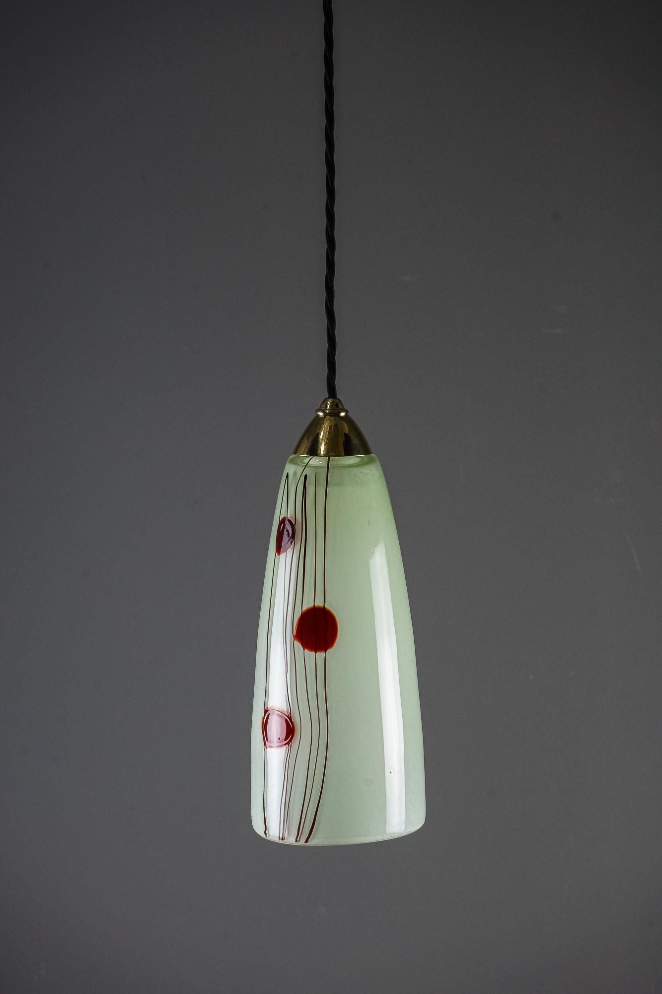 2 Murano pendants, Italy, circa 1980s
Brass parts polished and stove enameled
Wire is new
Price and sale per piece.