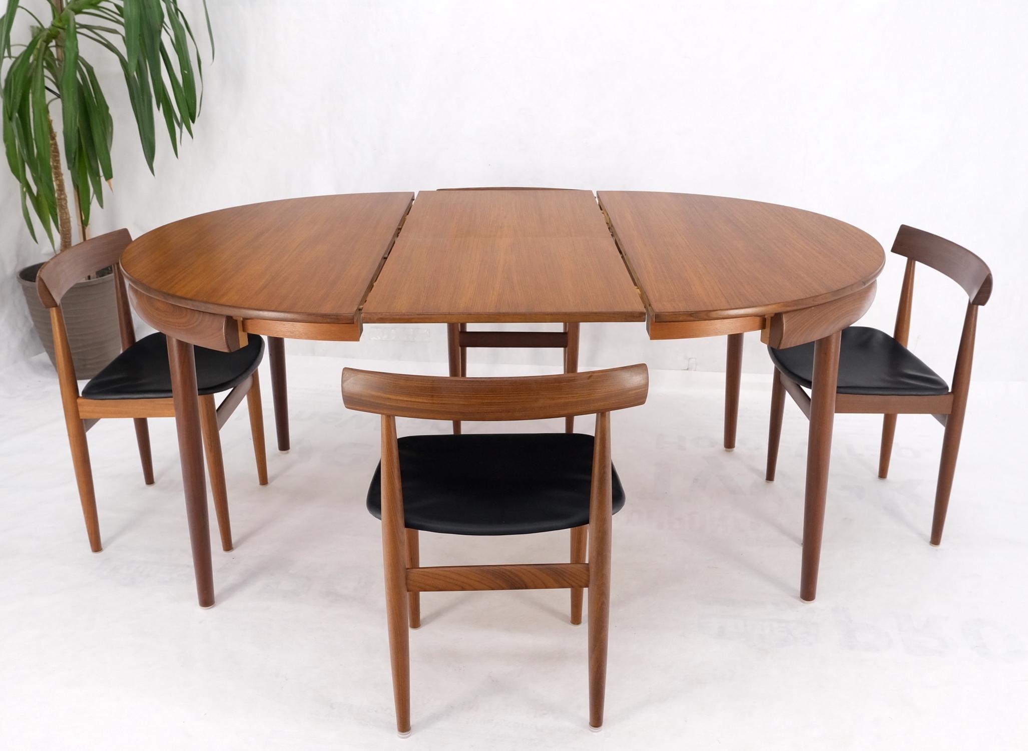 4 nNesting chairs Hans Olsen Frem Røjle round danish teak dining table leaf mint!
Table leaf measures 20 inches wide
Four chairs measuring 16'' D x 18'' W x 28'' H and 17.5'' seat height.