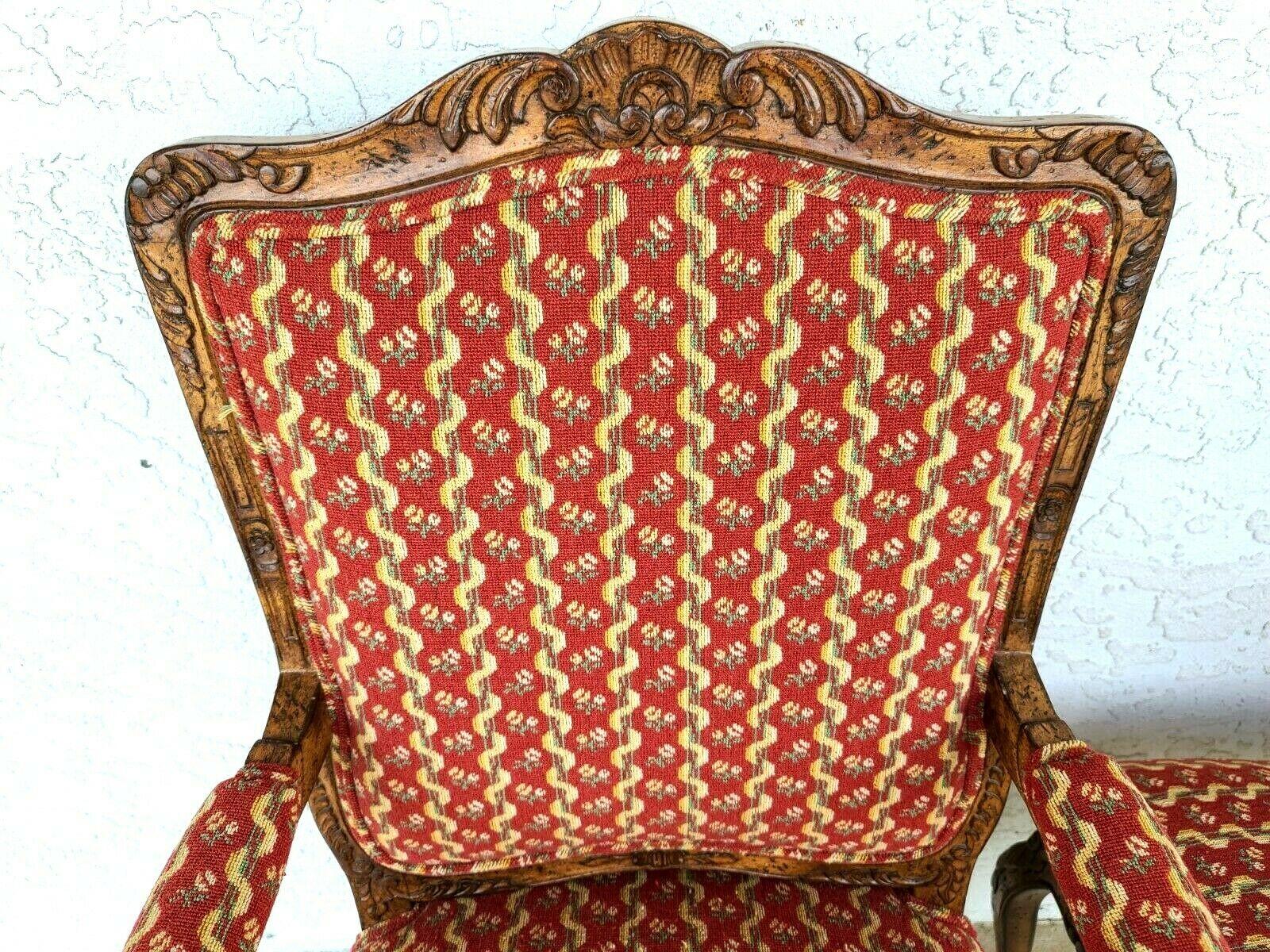 Vintage set of 4 Newly Upholstered French Provincial Louis XV Style solid wood dining chairs

Set includes 2 arm and 2 side chairs featuring a vibrant, subtle floral patterned cotton fabric and spring supported seats.

Approximate Measurements