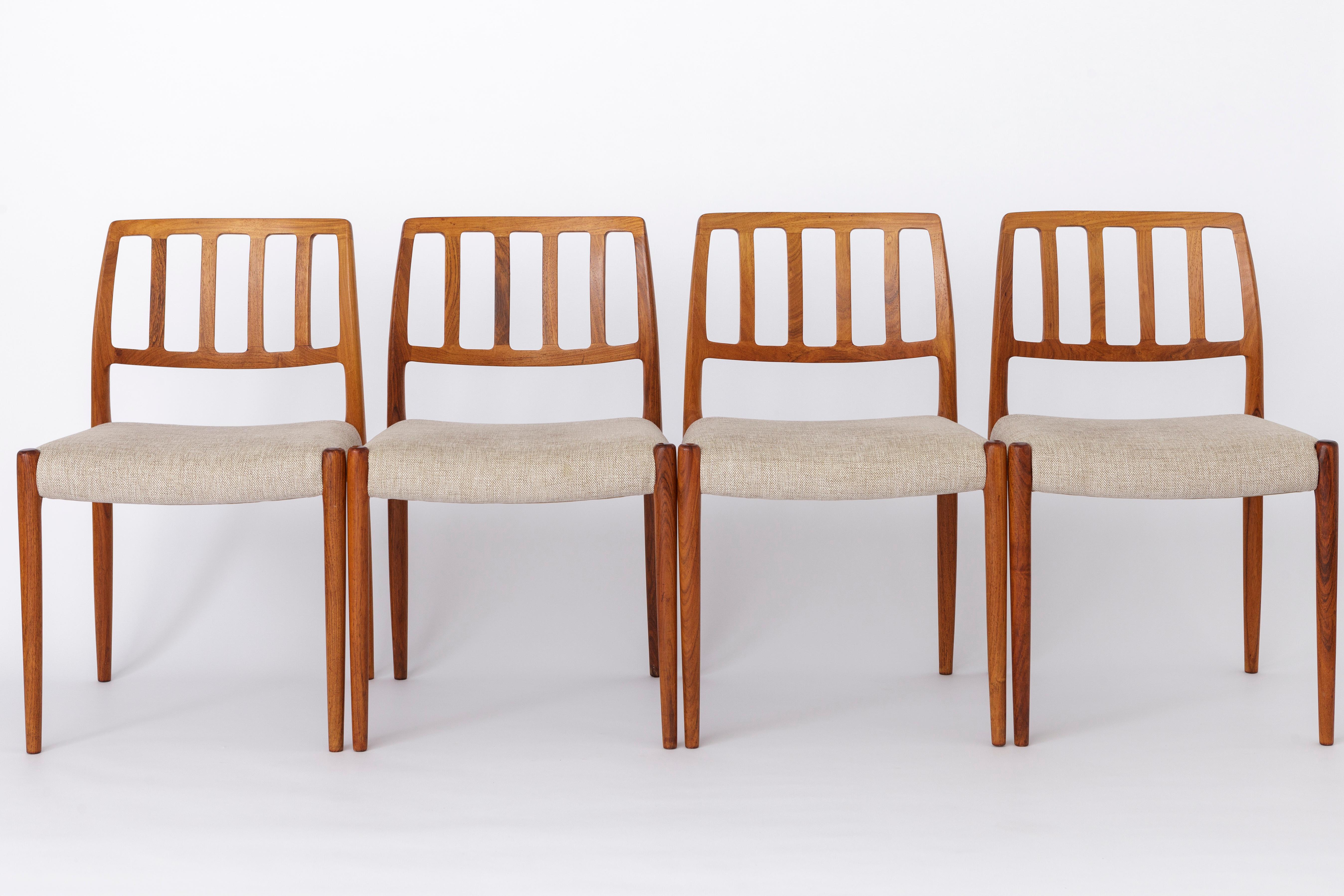 Set of 4 Niels Otto Moller chairs. 
Model: 83 from the 1970s in version rosewood. 
Displayed price is for a set of 4. 

Very good condition. Sturdy rosewood chair frame. Refurbished and oiled. 
Reupholstered with light grey textile seat cover (at a