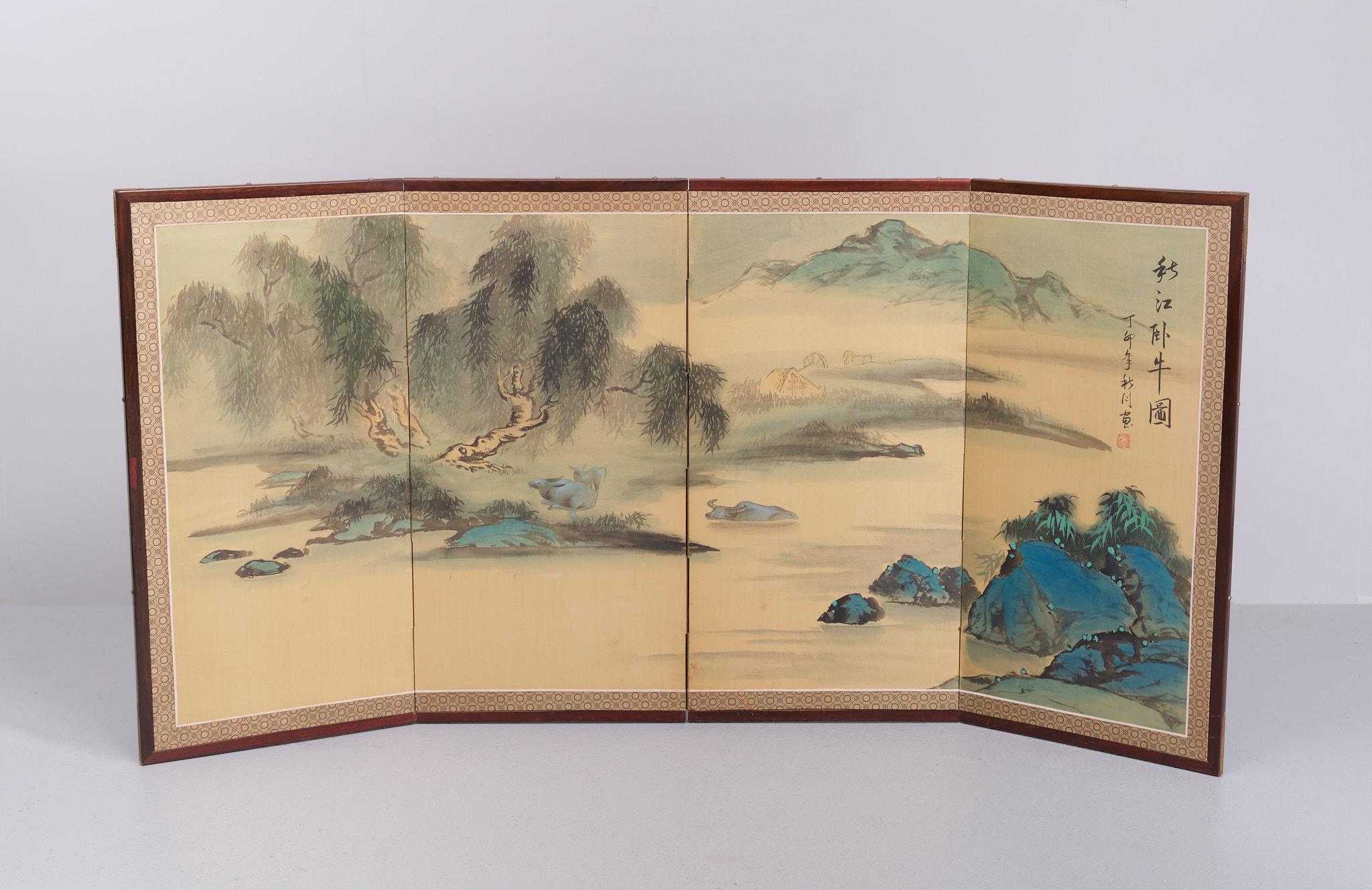 very nice 4 piece folding table screen .Japan  Watercolor ,landscape 
with some buffalo s en houses . signed  .Nice bright colors .