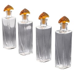 4 flaconi di profumo, modello Lalique