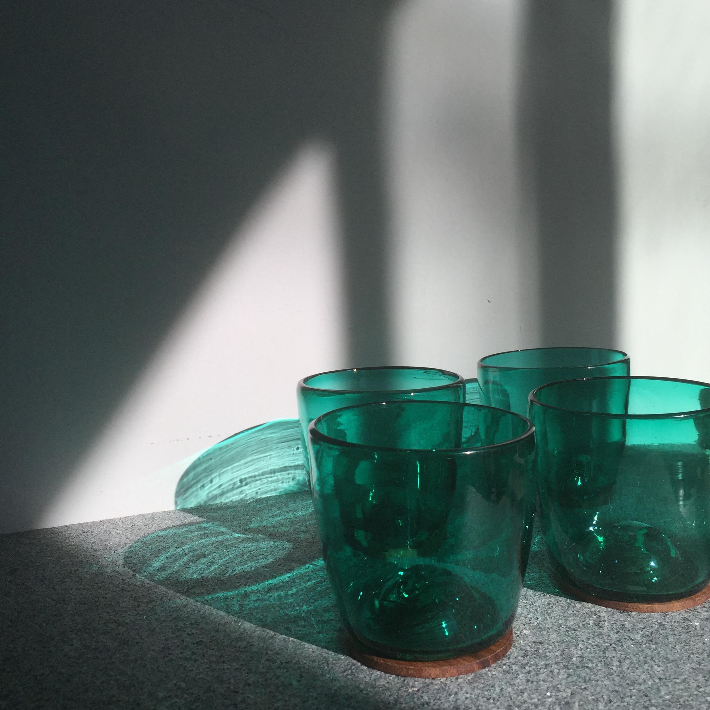Mexican 4 Piece Set of Green Hand Blown Glasses with Parota Wood Coasters For Sale