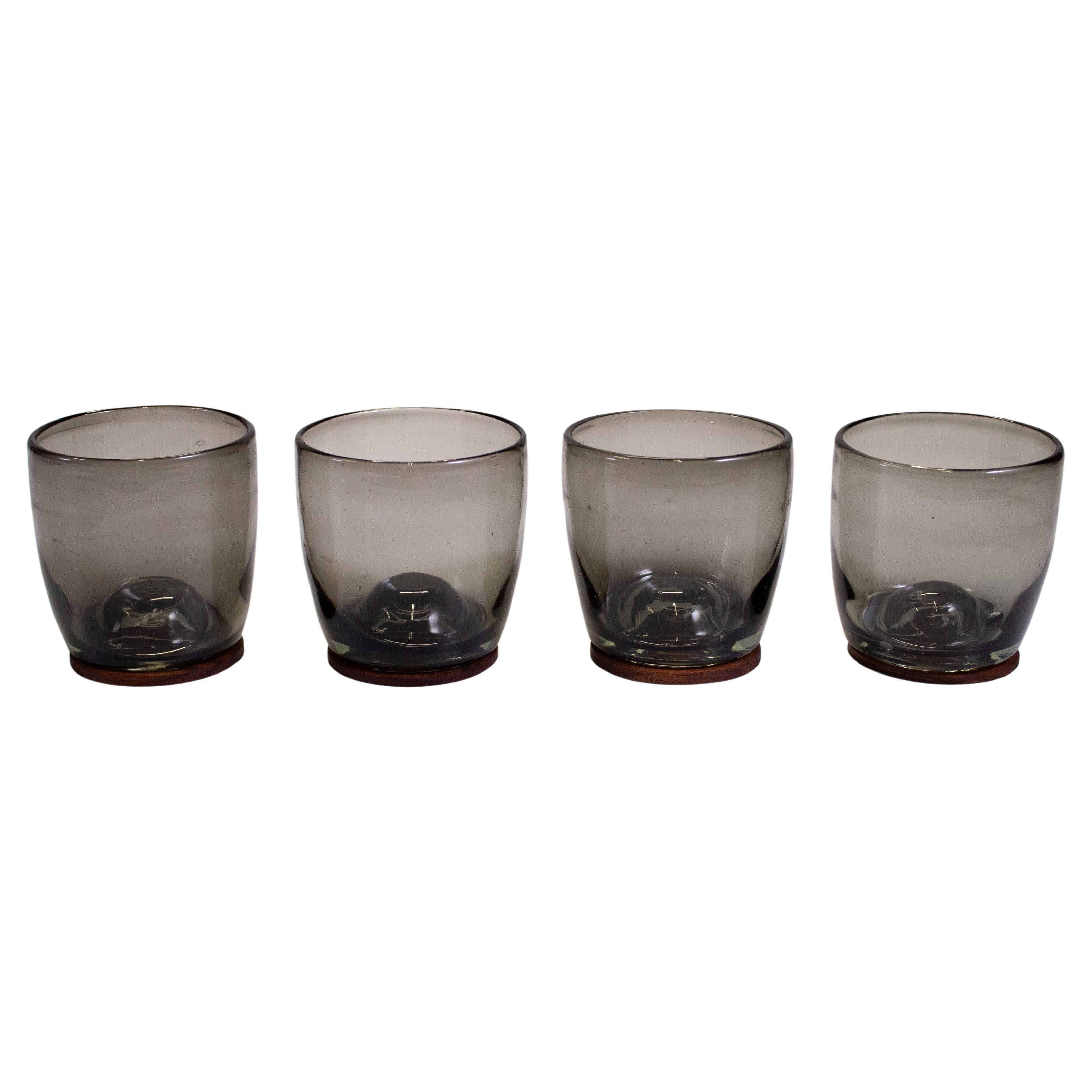 4 Piece Set of Smoke Hand Blown Glasses with Parota Wood Coasters For Sale