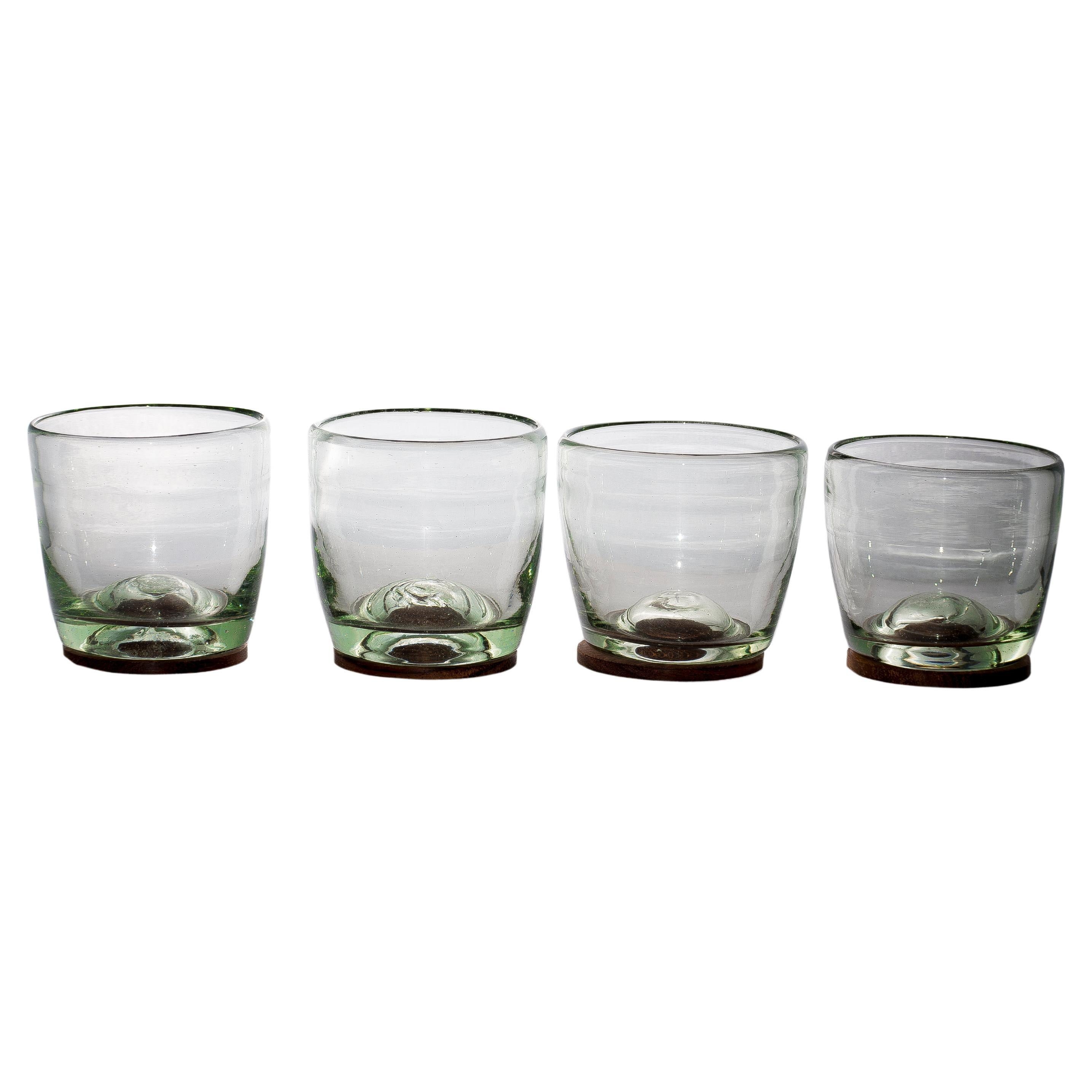 4 Piece Set of Transparent Hand Blown Glasses with Parota Wood Coasters For Sale