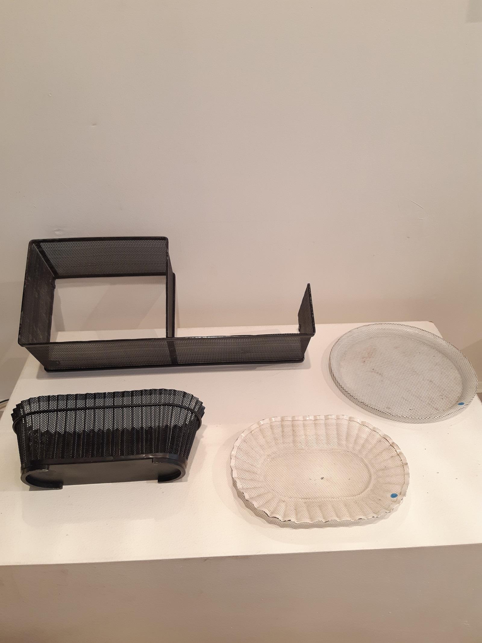 4 Pieces by Mathieu Mategot Rigitulle France 1950 Planter/Escargot Shelf/Tray
This set is composed of 1 Escargot shelf, 1 planter and 2 trays.
2 missing hooks on the shelf but it can be hung on a wall.
Orginal paint on the 4 pieces, traces of