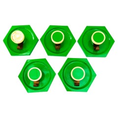 4 plastic wall hooks with brass hook around 1970s