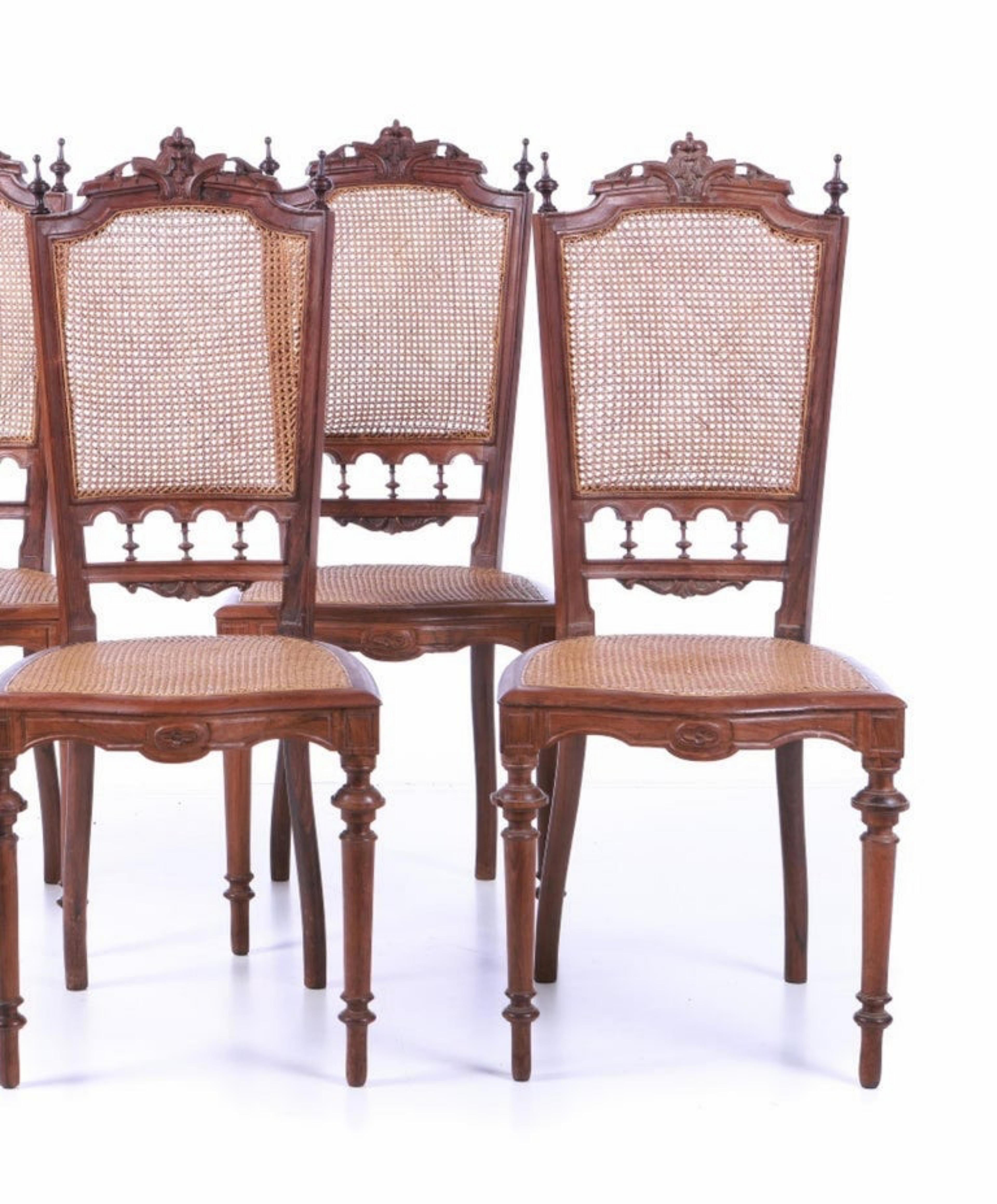 4 Chairs
Portuguese, 19th century
in Brazilian rosewood, carved. Seat and back in straw. Signs of use.
 Dimensions: 100 x 43 x 41 cm.