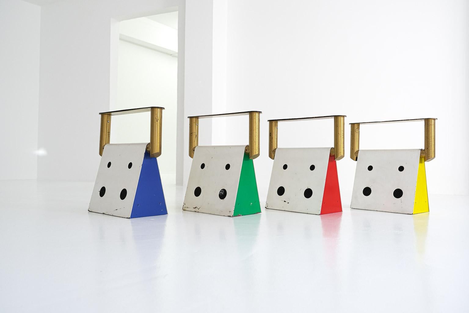Very rare set of four custom-made wall or ceiling lamps with triangular metal bodies and supported by a golden frame. Designed by Afra and Tobia Scarpa for the Benetton Group in the 1980s. The sides of the lamps are painted either red, blue, green