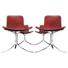 Used 4 Poul Kjaerholm PK9 E. Kold Christensen chairs with seat height extensions