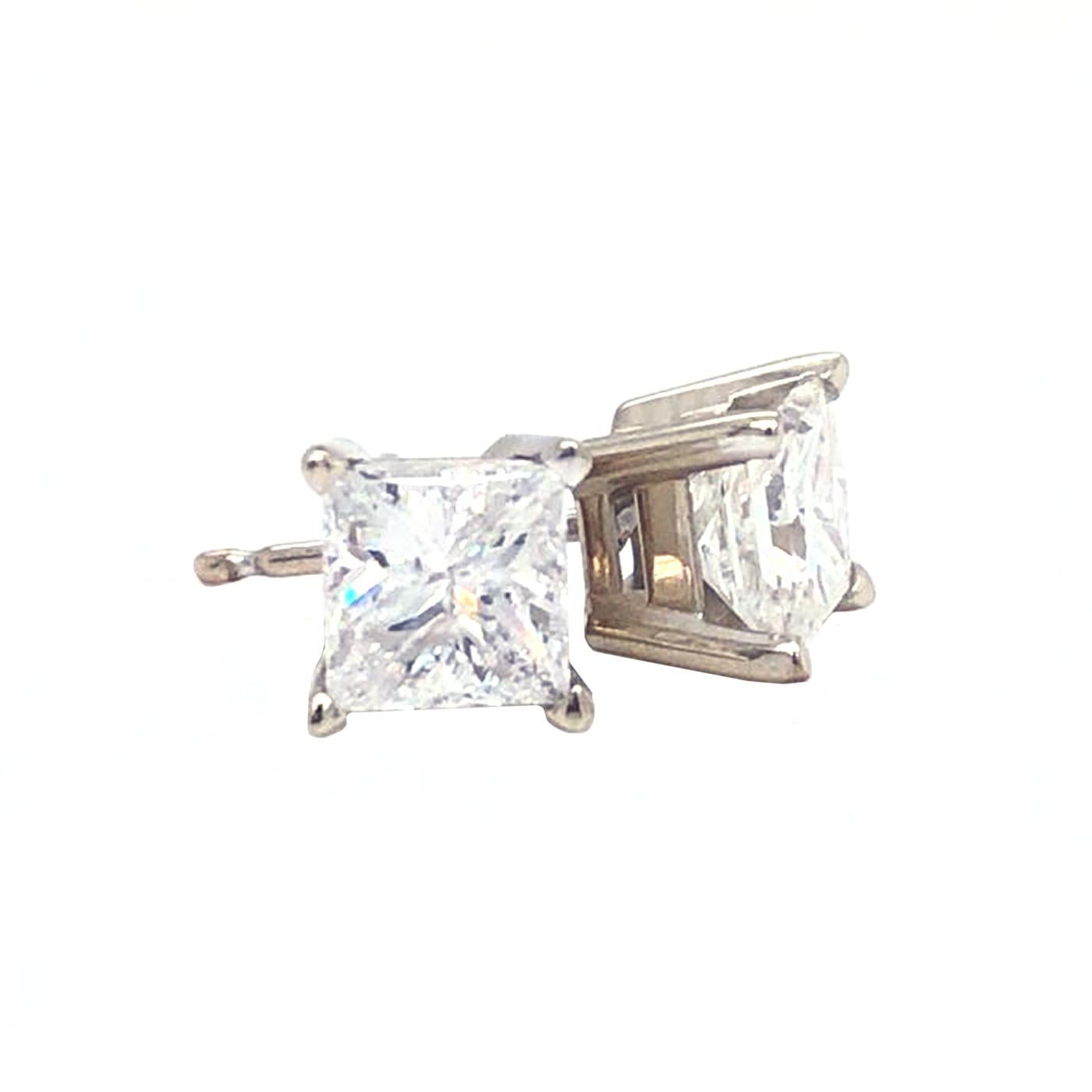 These 4 Prong stunning earrings are bound to sweep your girl off her feet. These diamonds have a total weight of 1.45 carat, have a SI2 - SI3 and a H - G in color. The diamonds are set in a 14 karat solid gold setting. Don't wait to own a classic