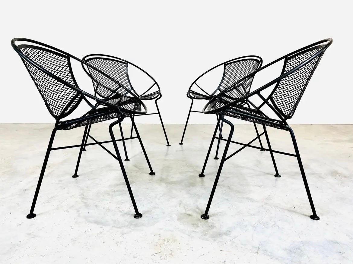 A set of 4 radar and mesh steel patio dining chairs designed by Maurizio Tempestini for Salterini. A very comfortable and attractive design with great lines. 
 All chairs are in fabulous vintage condition having solid welds throughout and minor