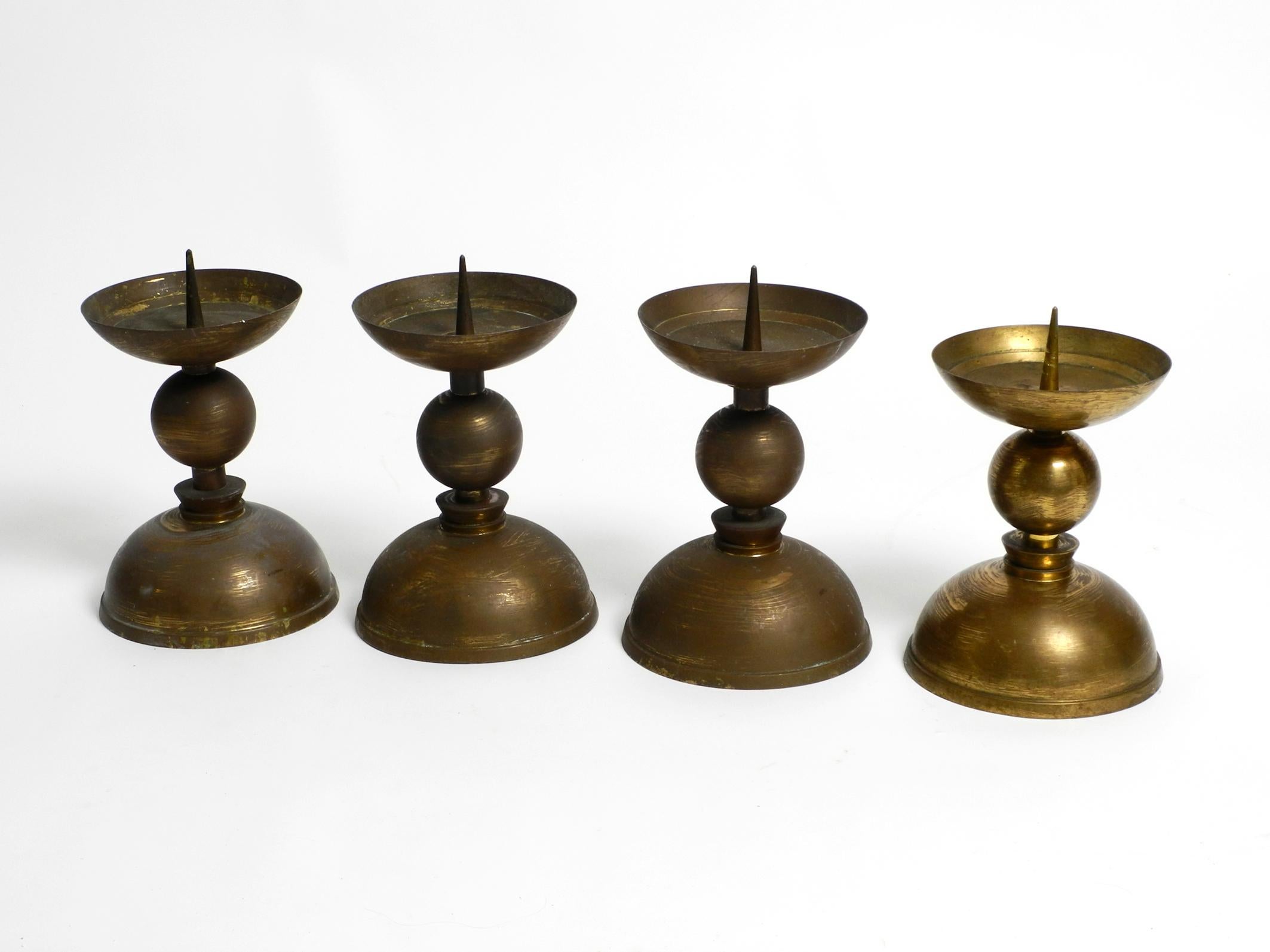 Four rare large heavy Mid Century Brass candlesticks.
For decades they stood in a Bavarian church.
Entirely made of solid brass. Screwed together from several parts.
Very good vintage condition. Very high-quality workmanship and with a great natural