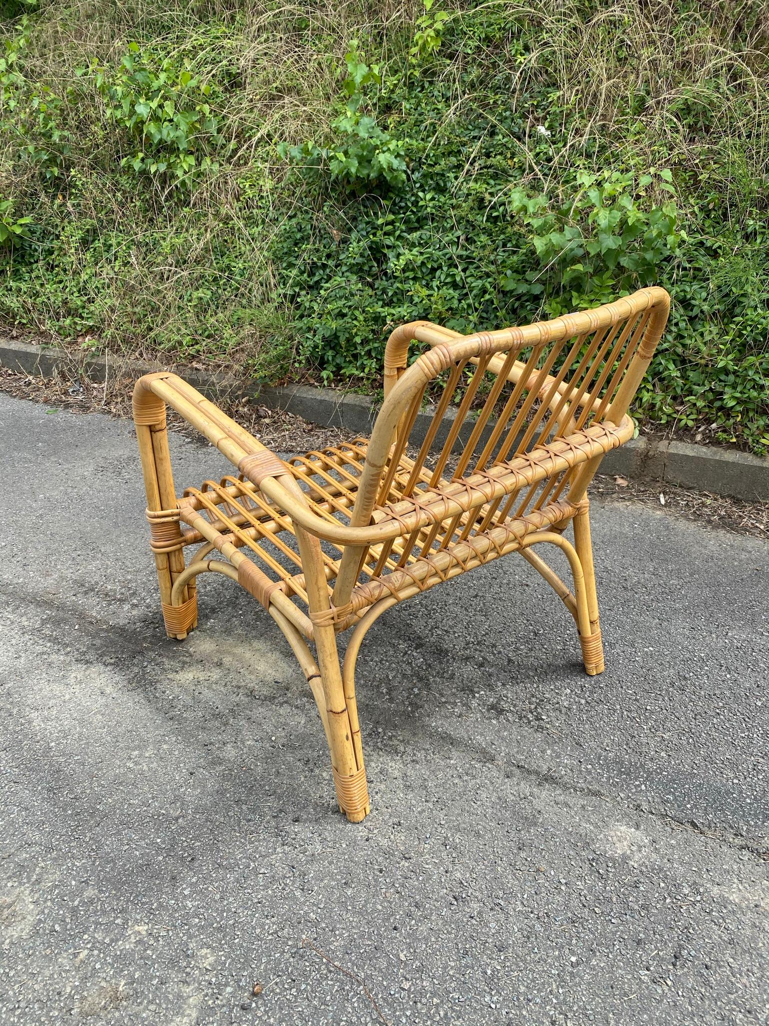 4 Rattan Armchairs and Their Cushions, circa 1970-1980 For Sale 1