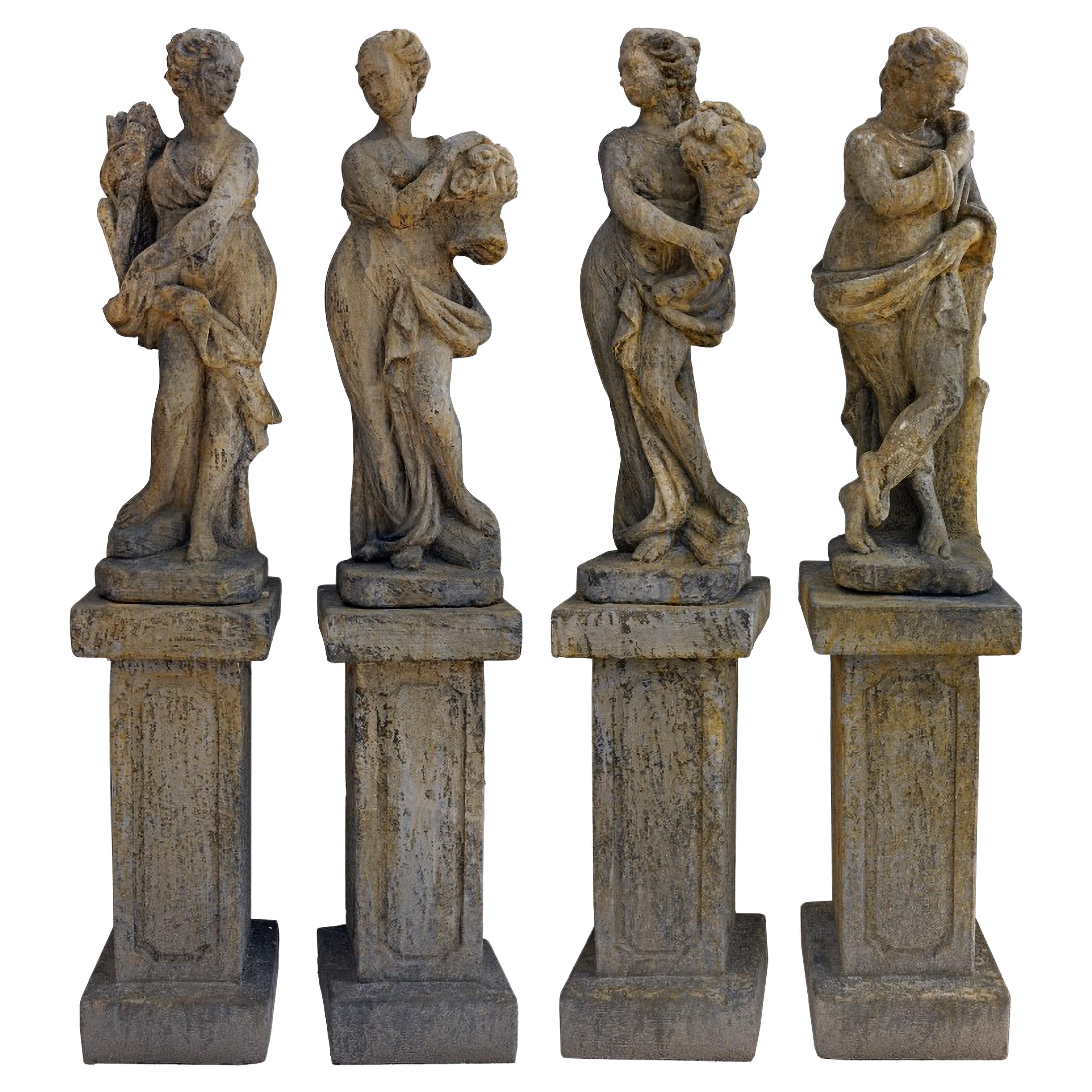 4 RECONSTITUTED STONE GARDEN STATUES WITH BASE THE FOUR SEASONS early 20th Cent. For Sale