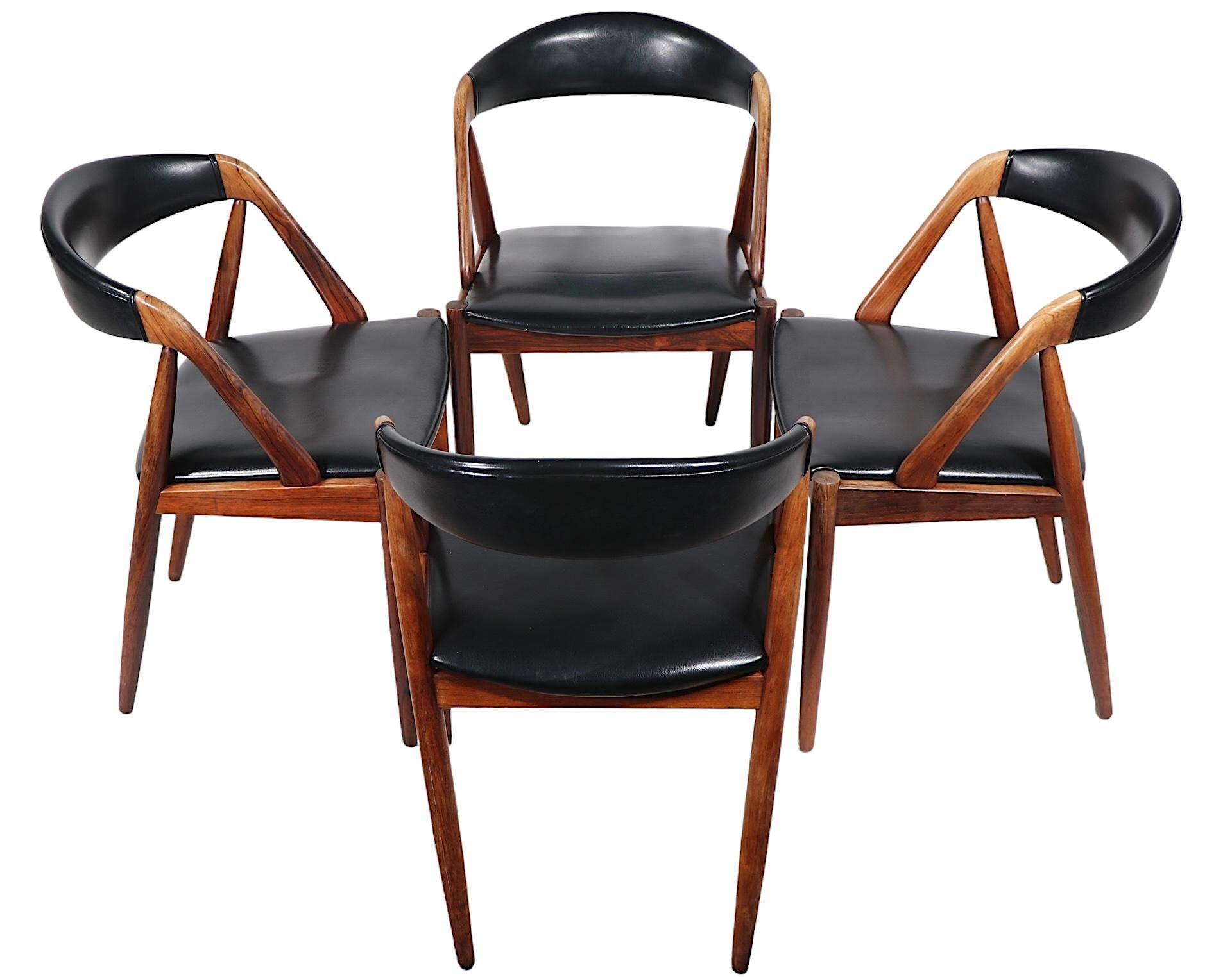 Naugahyde  4 Rosewood Model 31 Danish Mid Century Modern Dining Chairs by Kai Kristiansen  For Sale
