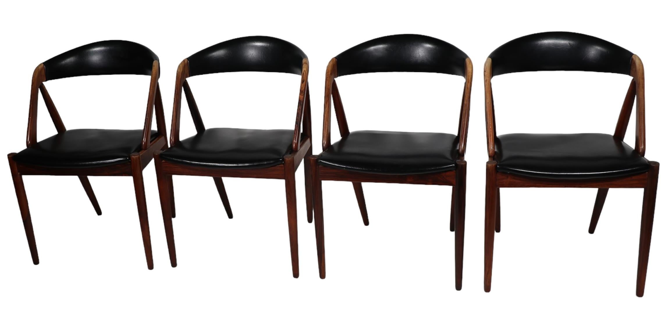 Naugahyde  4 chaises de salle à manger danoises modernes du milieu du siècle dernier modèle 31 de Kai Kristiansen  en vente