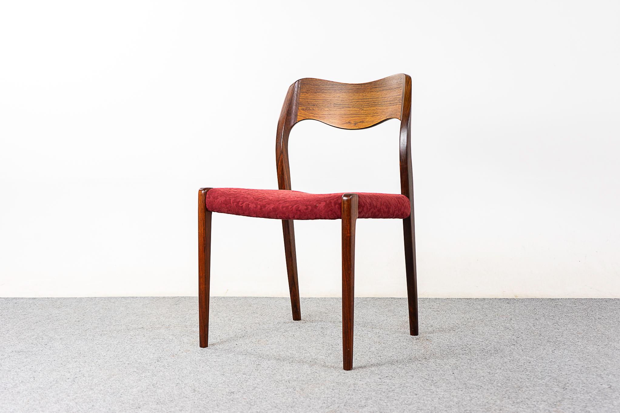 Set of 4 Rosewood Danish dining chairs by Niels Otto Moller for J.L Moller Mobelfabrik, circa 1960's. Highly sought after Model 71 design with signature curved backrest and elegant, graceful lines. Original upholstery with minor wear & tear. 