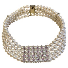 Collier ras du cou à 4 rangées de perles, rubis et diamants en platine