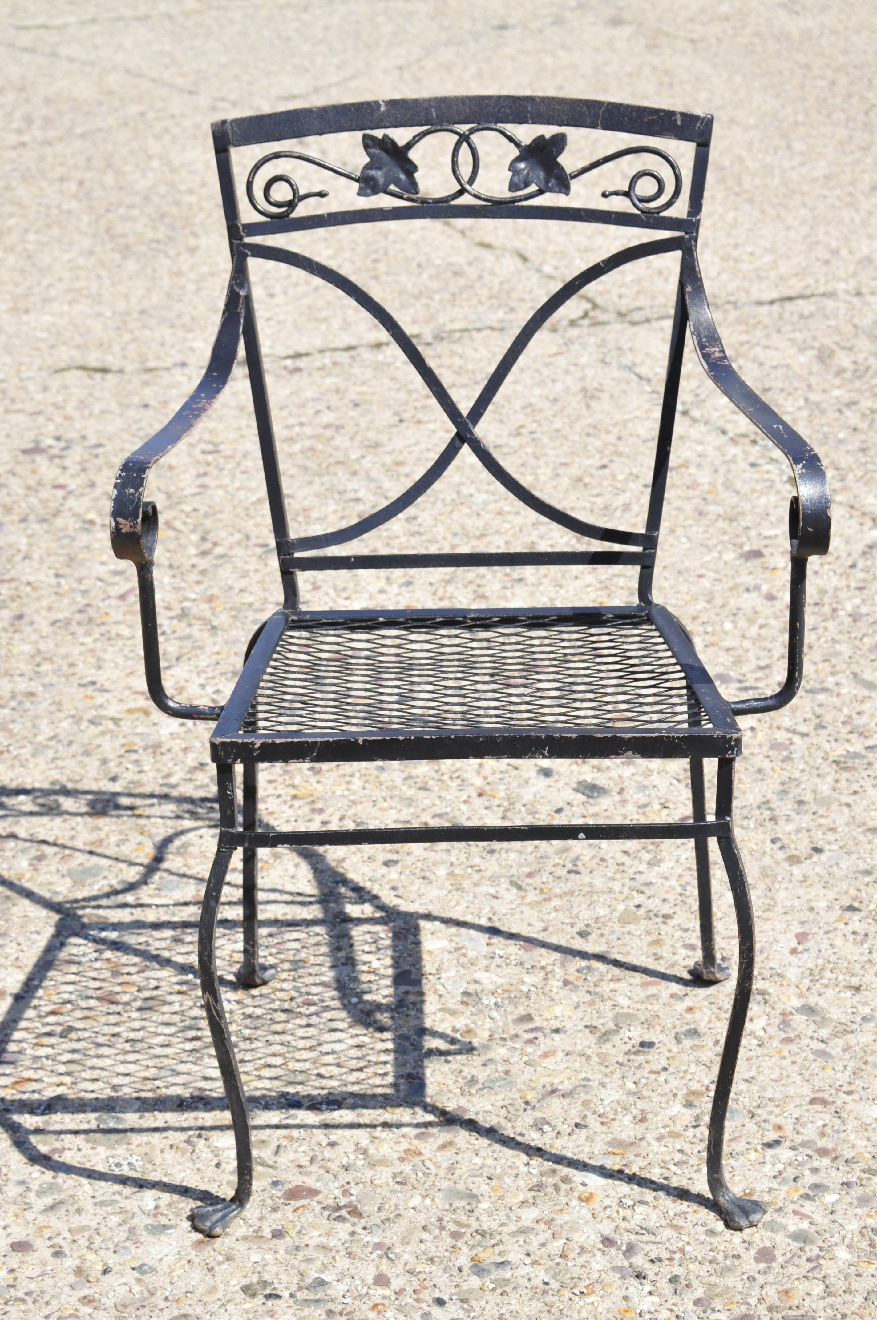 4 Salterini Mt.Vernon maple leaf stacking garden patio dining armchairs. Listing includes (4) stacking armchairs, maple leaf and vine design, metal mesh seats, wrought iron, construction, great style and form. Mid-20th century. Measurements: 33