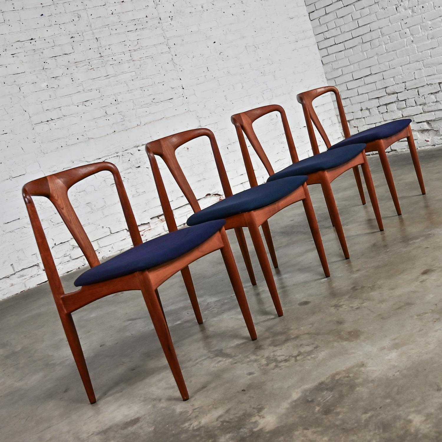 Wonderful 1960’s Mid Century Scandinavian Modern dining chairs Attributed to Johannes Andersen Juliane chair, set of 4 comprised of teak frames and new black canvas fabric seats. This piece has been attributed based upon archived research including