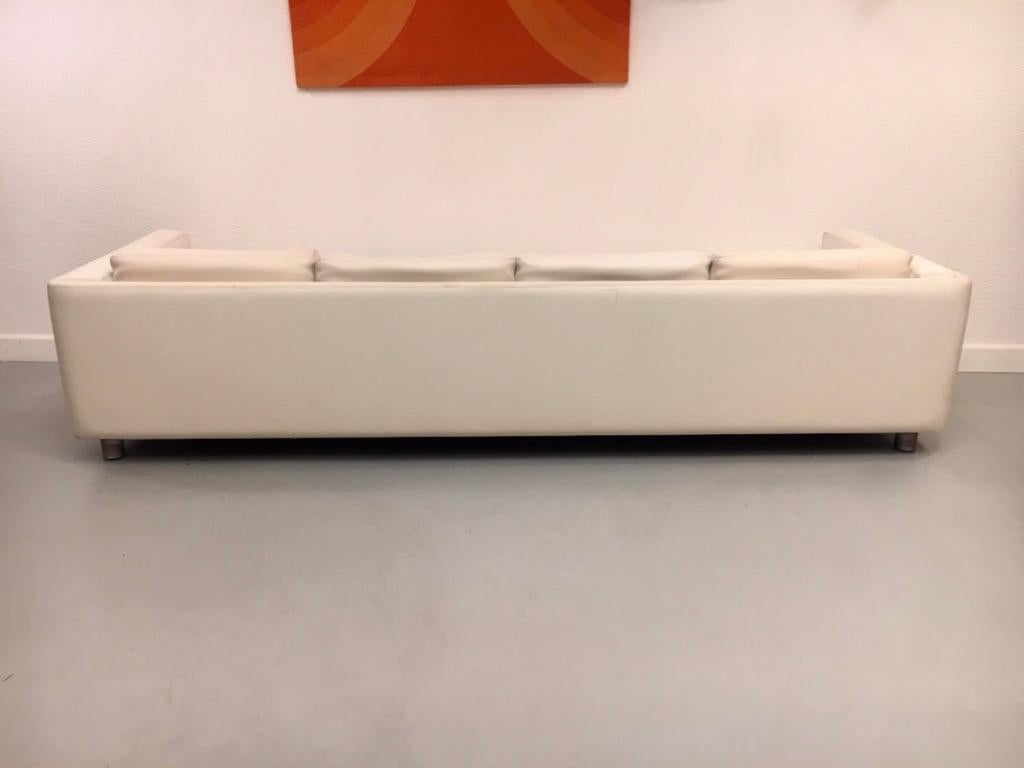 white faux leather sofa