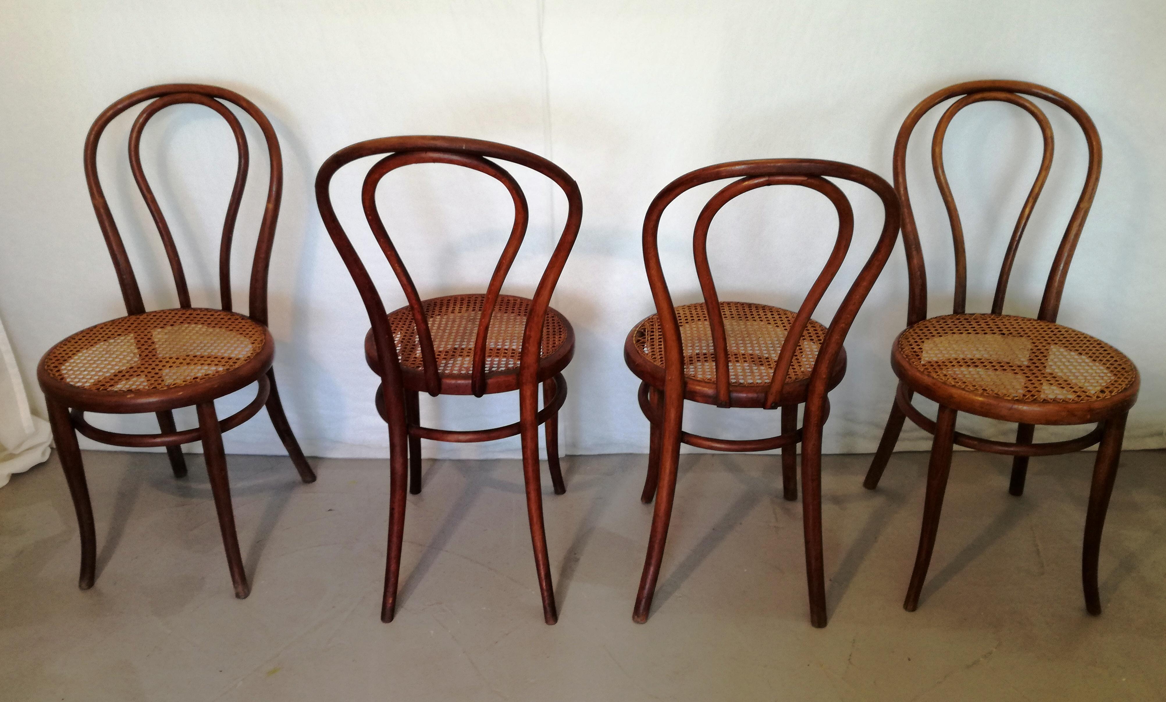 4 thonet-type chairs No. 18. 
1 branded Thonet Austria ,2 branded Thonet ,1 branded jacob & koln .the chairs are practically the same as each other. the wooden frames bear woodworm holes (treatment performed). the seats bear signs of use. in