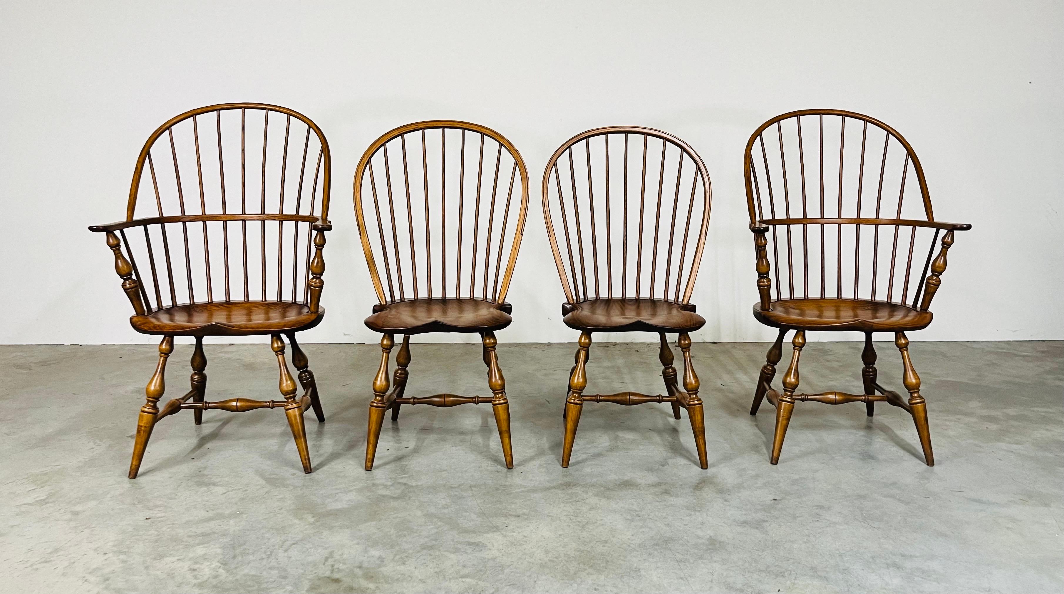 A beautiful set of 4 spindle back Windsor chairs comprised of maple, oak and pine hand crafted having mortise and tenon joinery in seats and backs by Habersham Plantation Corp. North America 1987.
In excellent condition having been masterfully