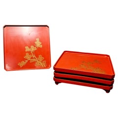 4 Square red footed trays, Early 20th Century