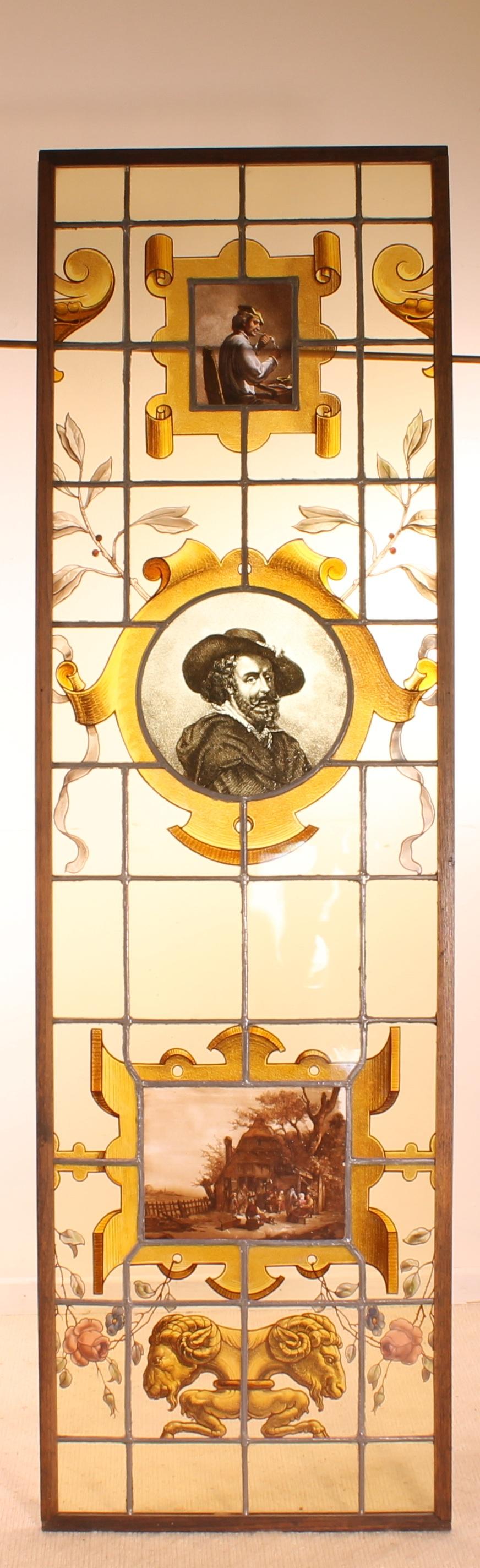 - Magnificent set of 4 windows of the 19th century representing the great painters of the Flemish Renaissance.
At the top of each stained-glass window are men playing guitar, smoking a pipe or drinking a beer and at the bottom of each stained-glass