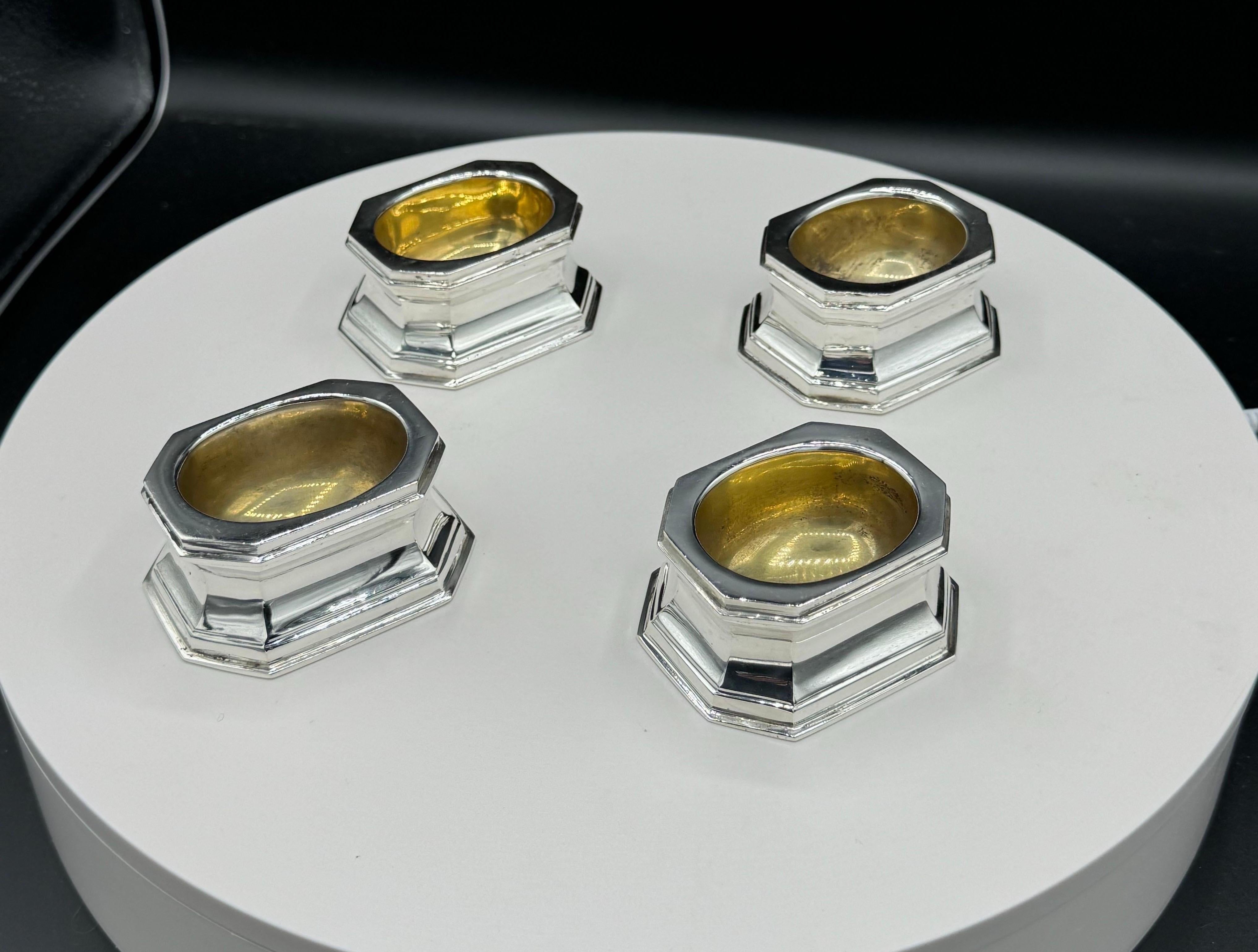 4 Sterling Silver Tiffany & Co Silver Salts : Polished, 4 silver pedestal salts. 4 handsome Edwardian era Sterling silver trencher form salts with oblong octagonal base and traces of vermeil to basins; with silver marks for Howard & Company. England