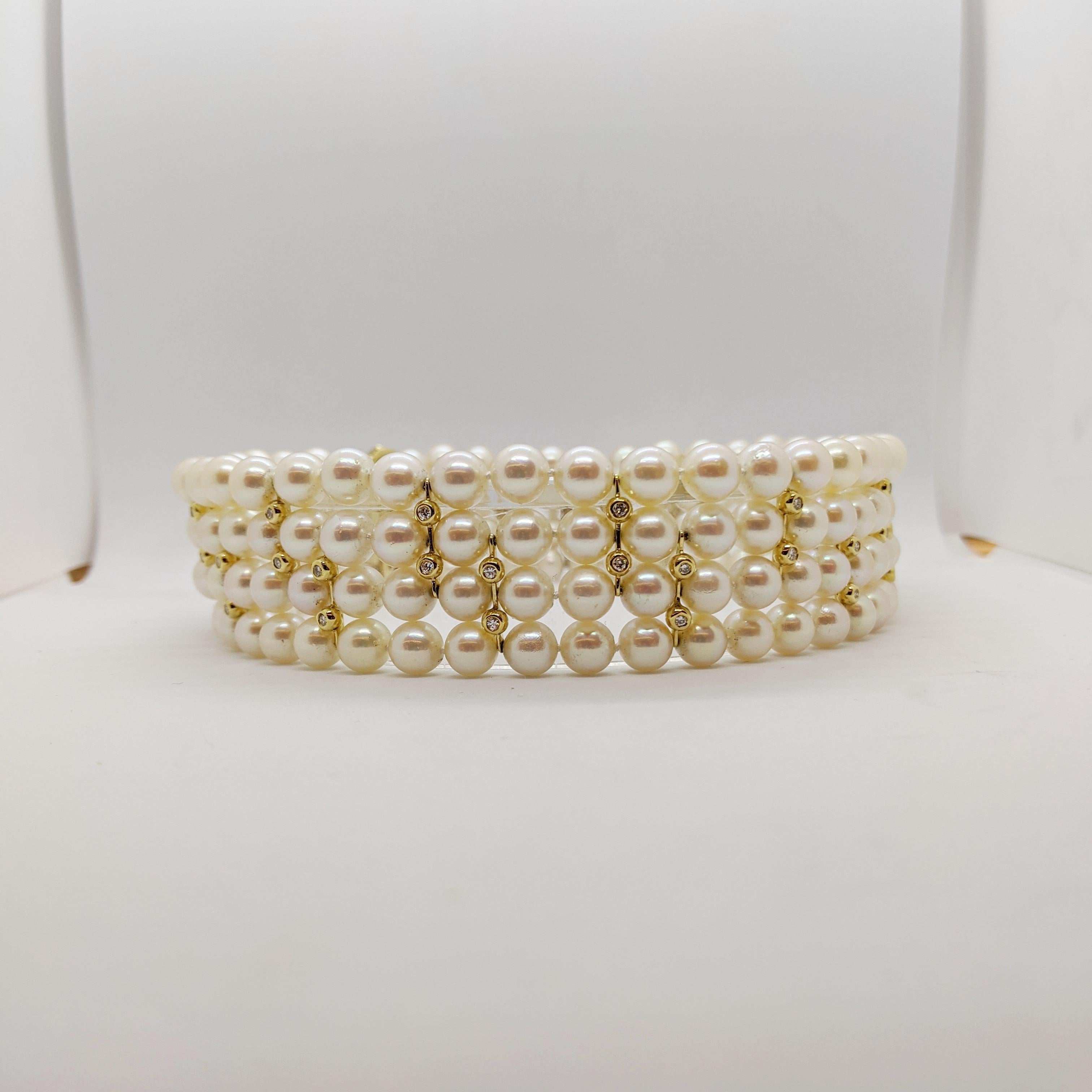 Steal the show with this magnificent Japanese cultured pearl choker. Comprised of 4 rows of AAA 8mm Japanese cultured pearls. The beauty of these pearls is further enhances with 18kt yellow gold and diamond dividers, adding just the right amount of
