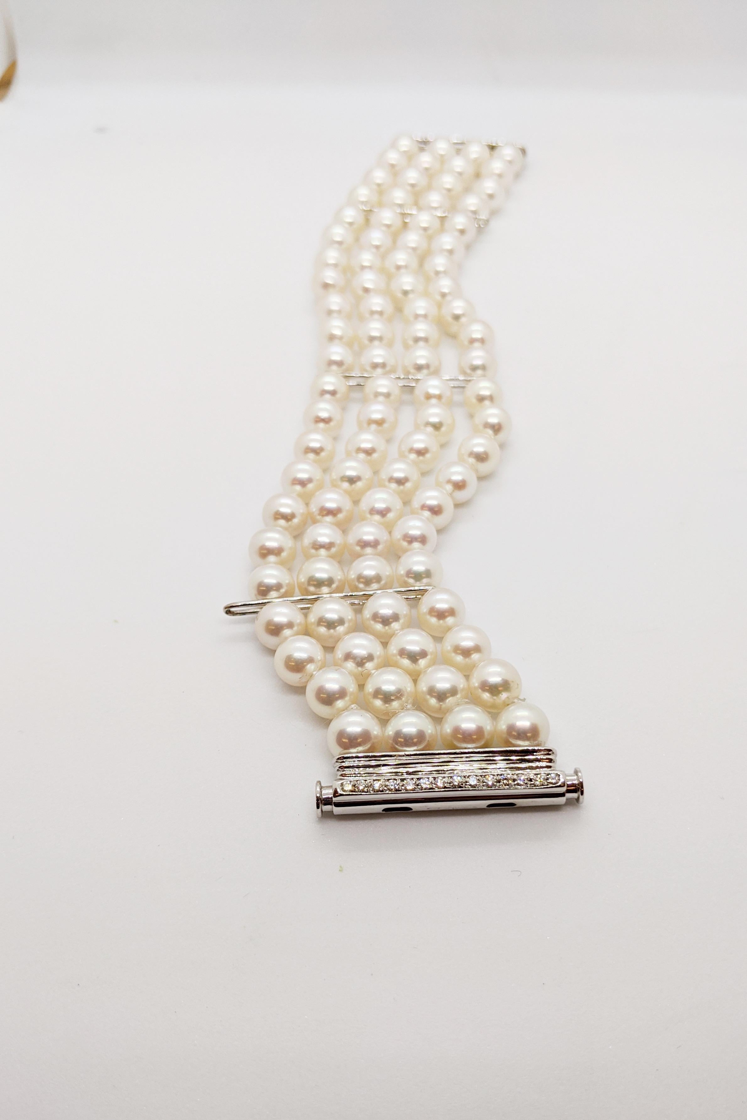 Round Cut 4-Strand Japanese Cultured Pearl Bracelet with 18 Karat Gold & Diamond Bar Clasp For Sale