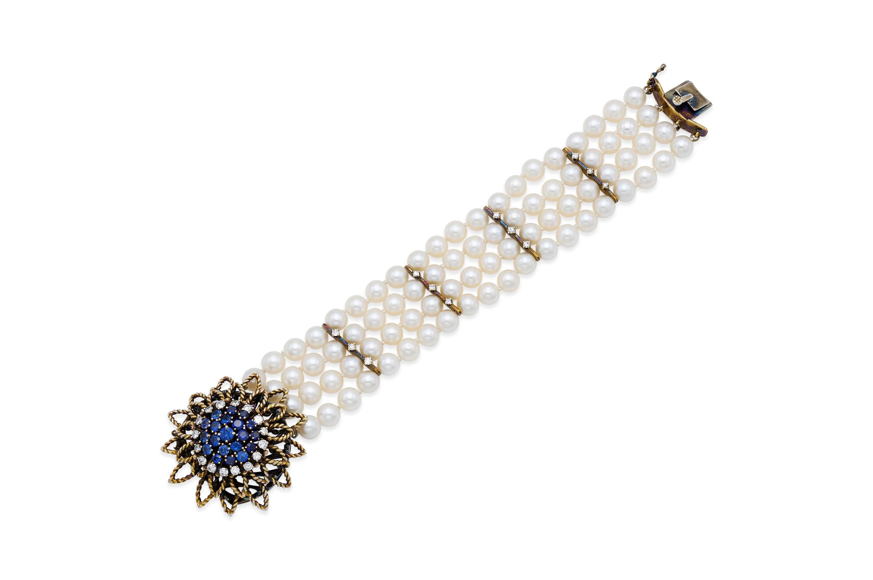 Finely crafted in 14k yellow gold with 80 pearls of 6mm, round cut Diamonds weighing approximately a total of 1.30 carats, and round cut Sapphires weighing approximately a total of 1.50 carats.
Circa 1950s