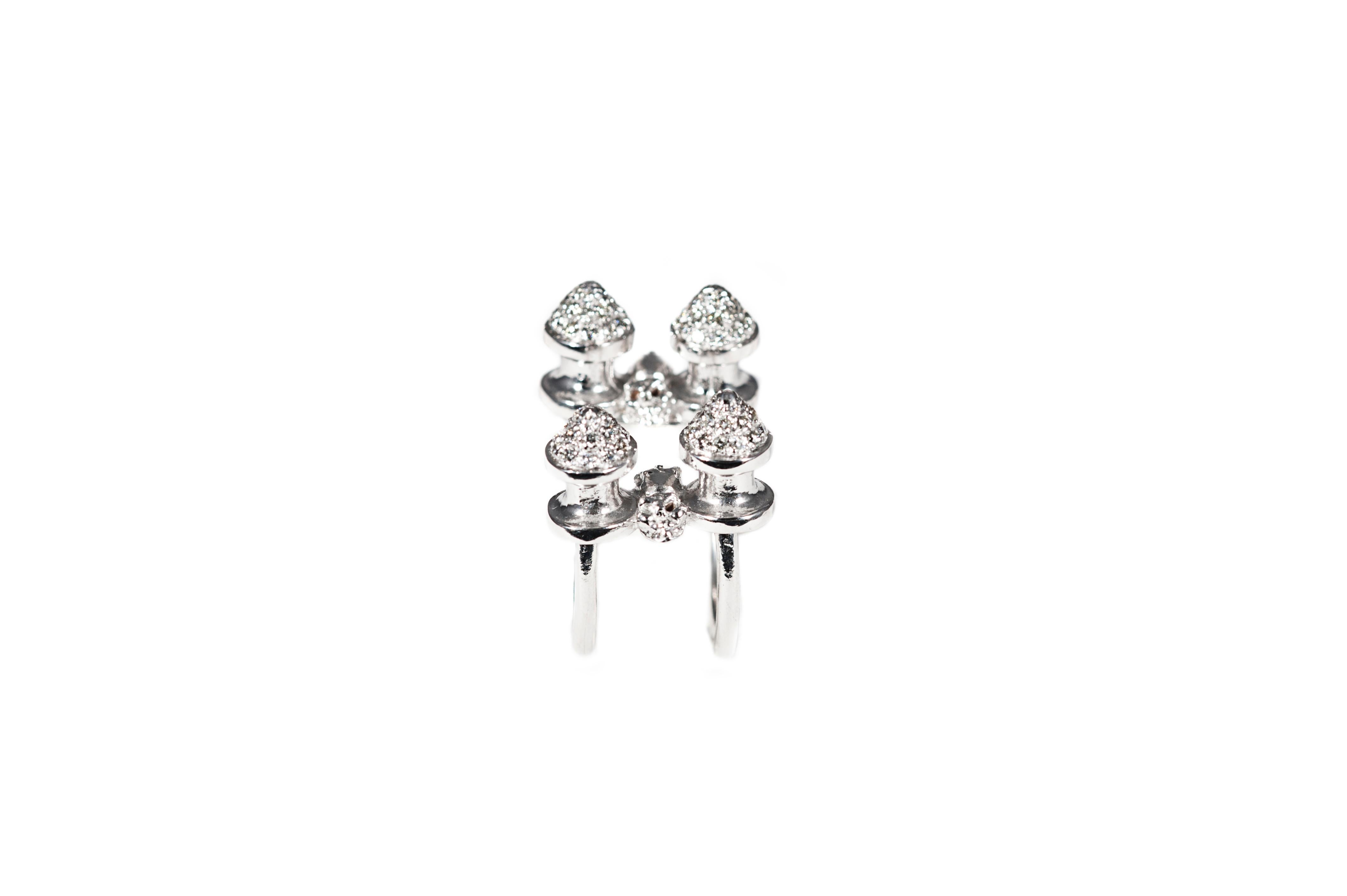 4 Studs white gold ring with diamonds

Composition:
Gold 12,30 gr (9K)
100 diamonds 1,30 ct

Size is adjustable from 5 3/4 US to 6 US ( italian size from 11 to 12)
Other sizes on demand, working time approx 15 days.