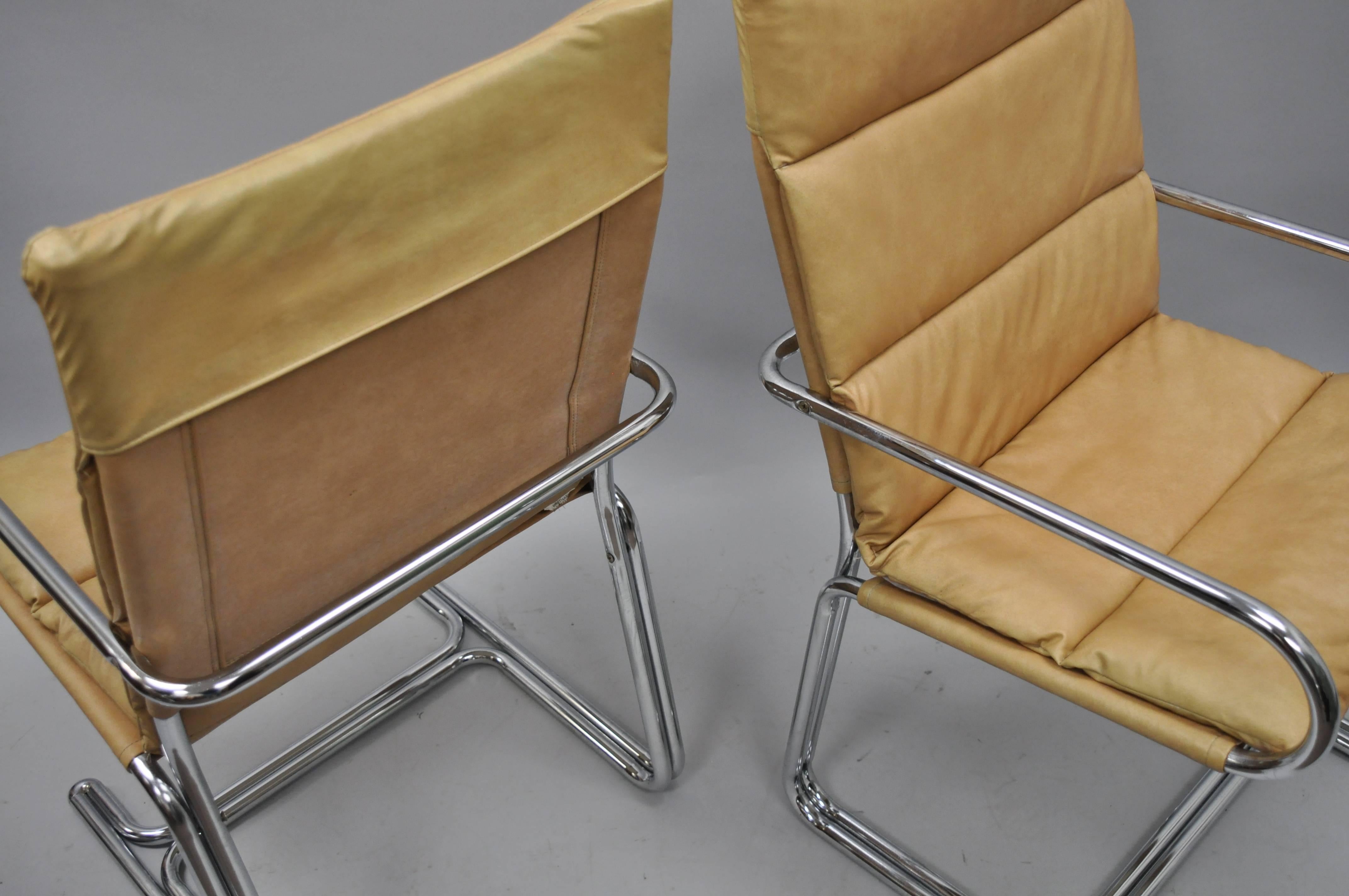 Upholstery Four Tubular Chrome Cantilever Style Arm Chairs by Cosco Inc after Milo Baughman