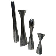 4 Various Size and shaped Nambe Polished Aluminum Candleholders 4 Various Size and shaped Nambe Polished Aluminum Candleholders