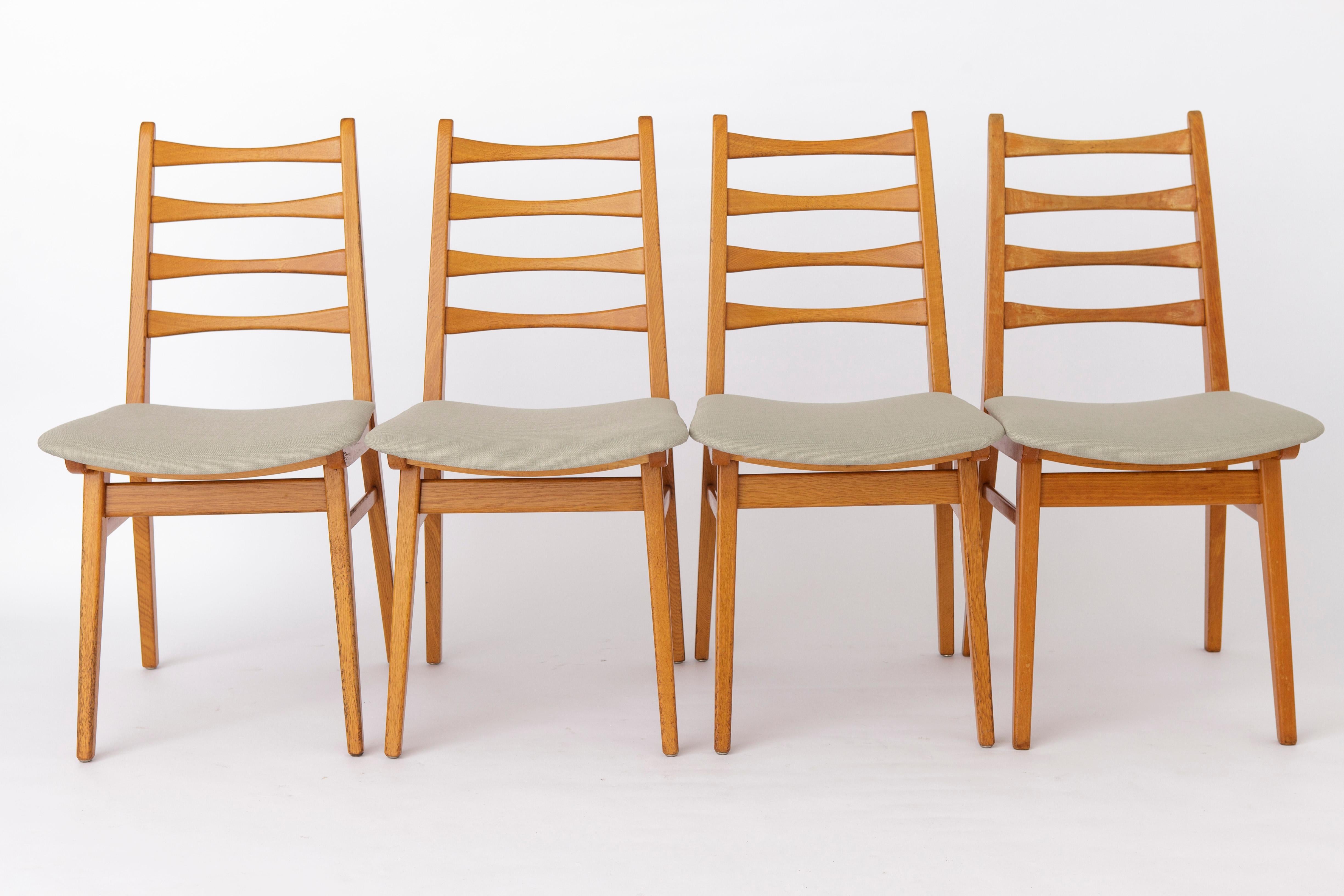 Set of 4 Vintage Chairs by German manufacturer Kuhlmann & Lalk. 
Displayed price is for a set of 4. 
PS: There is an arm chair in the next ad that fits perfectly to this set. 

Sturdy beech wood frame. Refurbished and oiled. 
Seats were