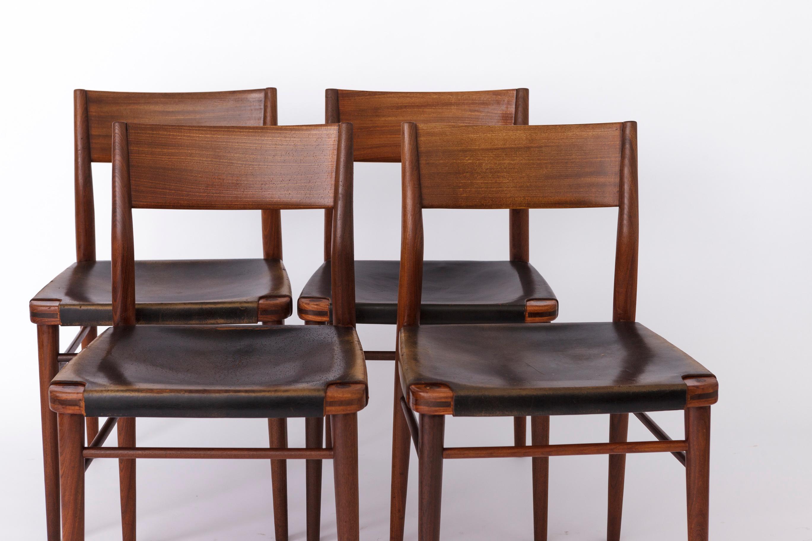 Set of Dining Chairs by German Designer Georg Leowald for Wilkhahn

First designed in 1954, with production most likely in the late 1950s to early 1960s, this set of four dining chairs embodies timeless elegance and unique design. If you're