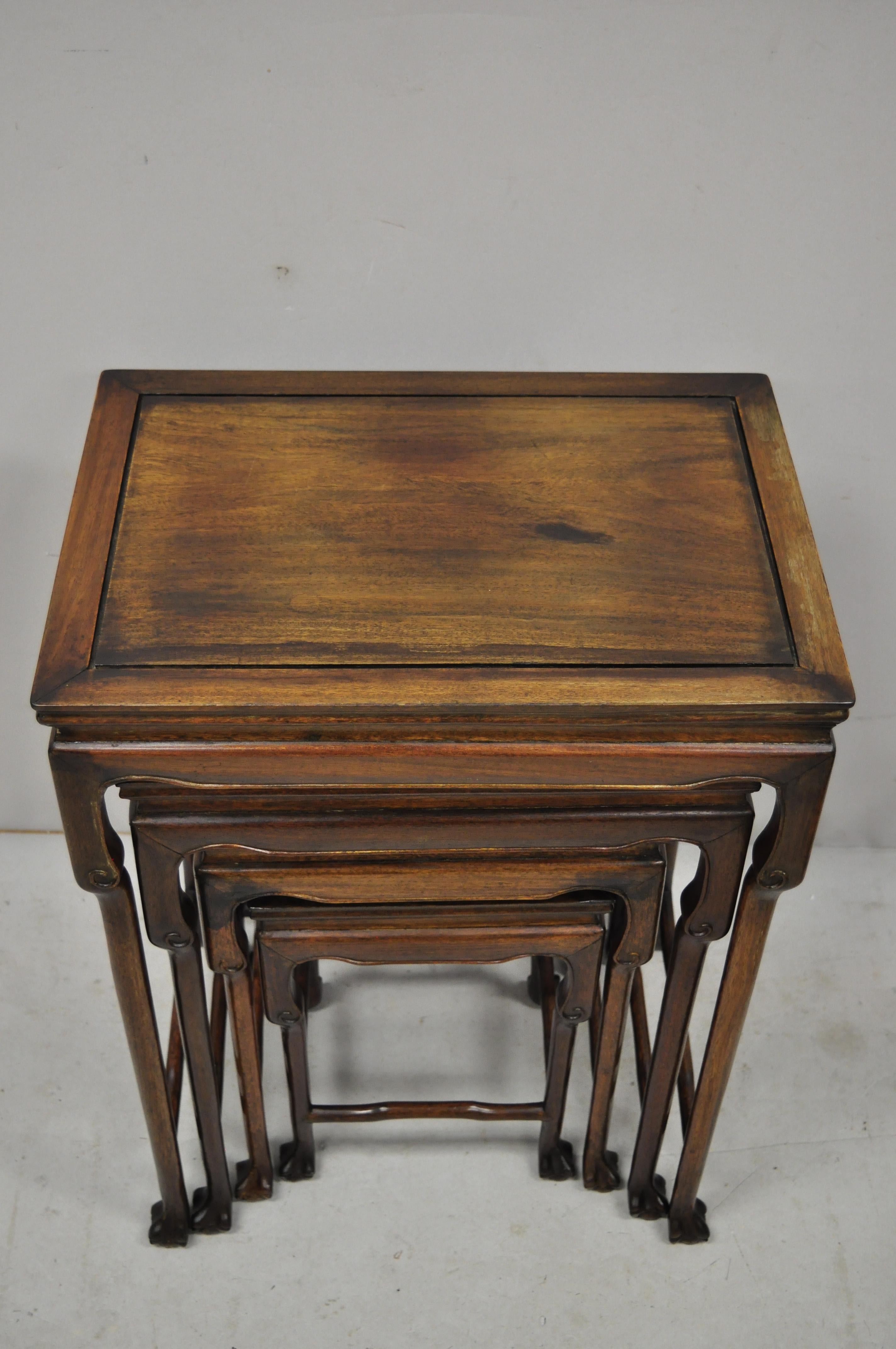 Chinoiserie 4 Vintage Chinese Carved Hardwood Rosewood Nesting Side Tables with Paw Feet For Sale