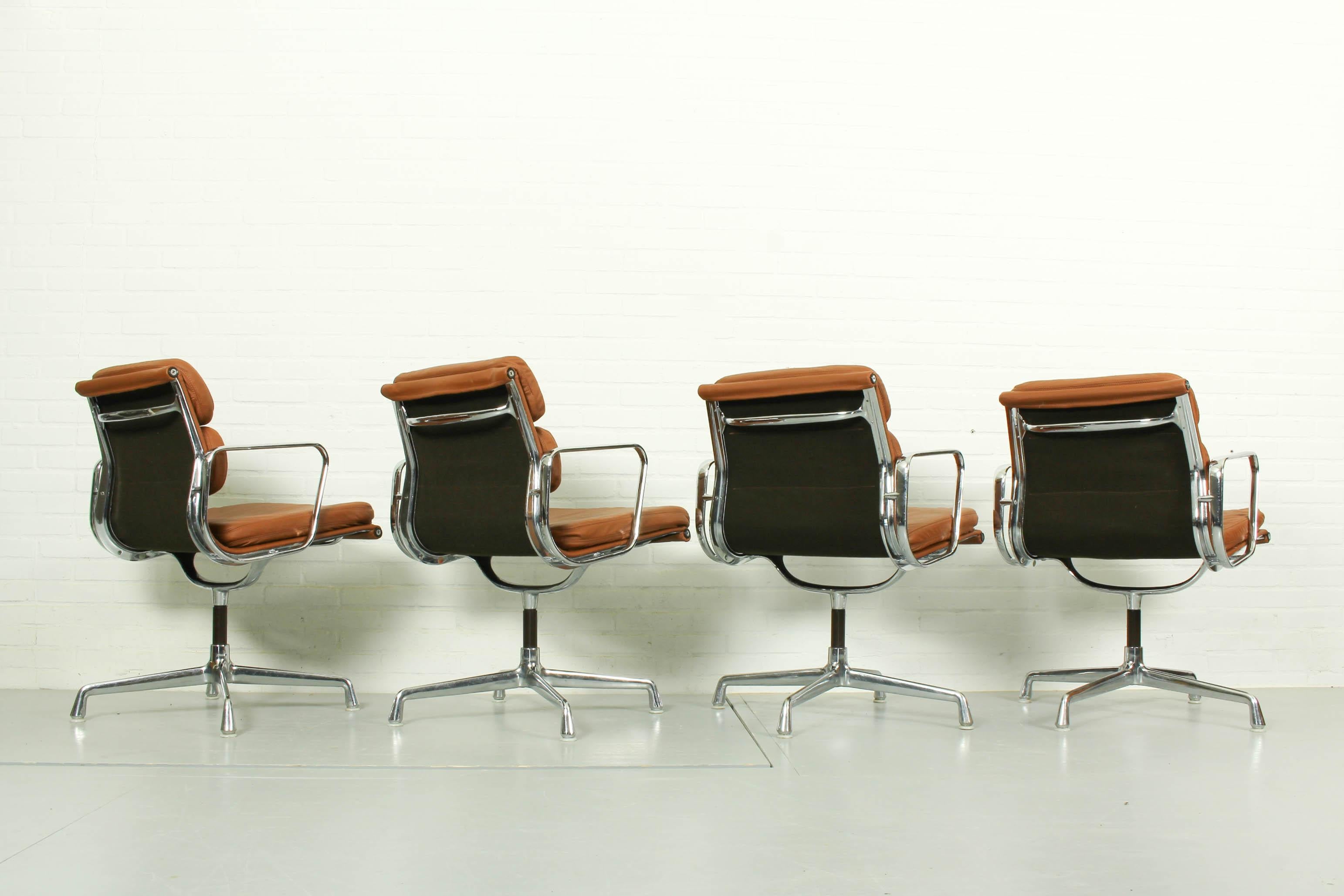 20th Century 4 Vintage Cognac Leather EA208 Soft Pad Chairs Charles Ray Eames for Vitra 1970s