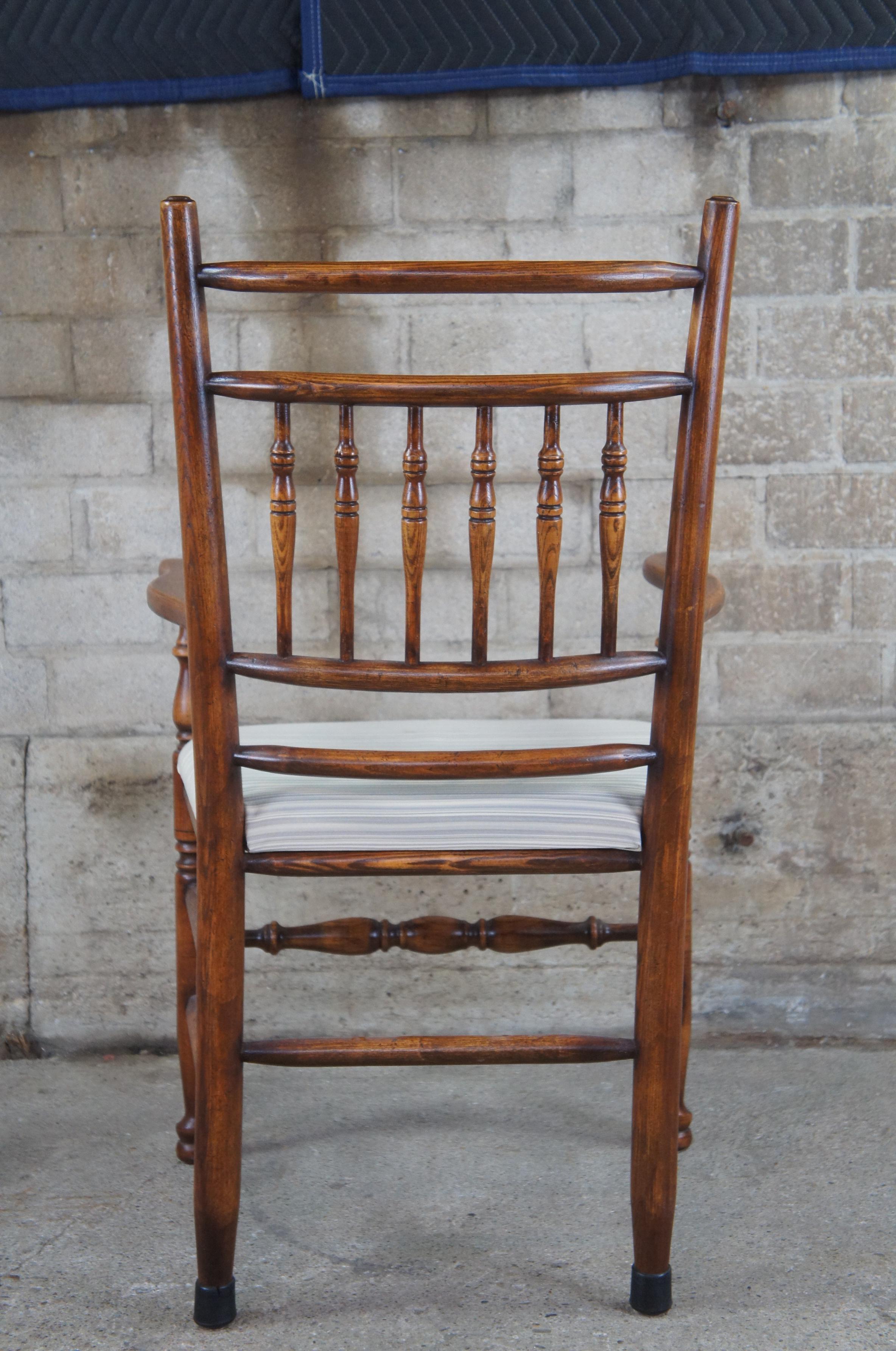 Late 20th Century 4 Vintage English Country Lancashire Oak Spindle Back Dining Arm Chairs