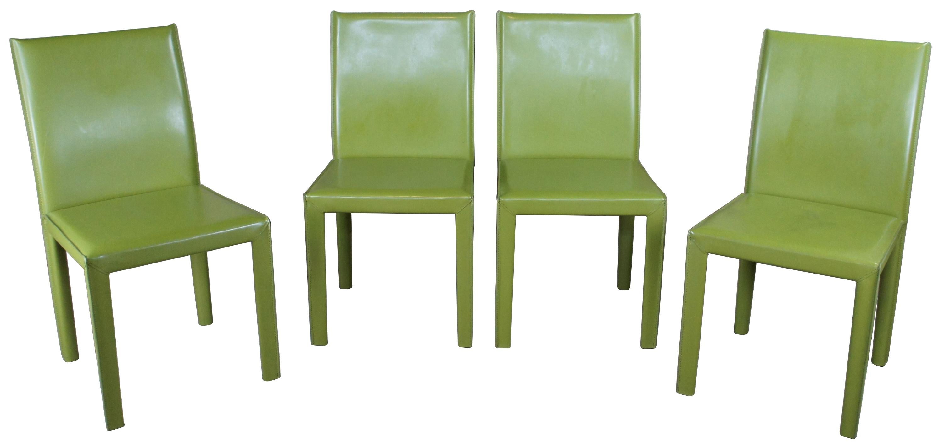 Four vintage Maria Yee bonded leather side dining chairs.
  