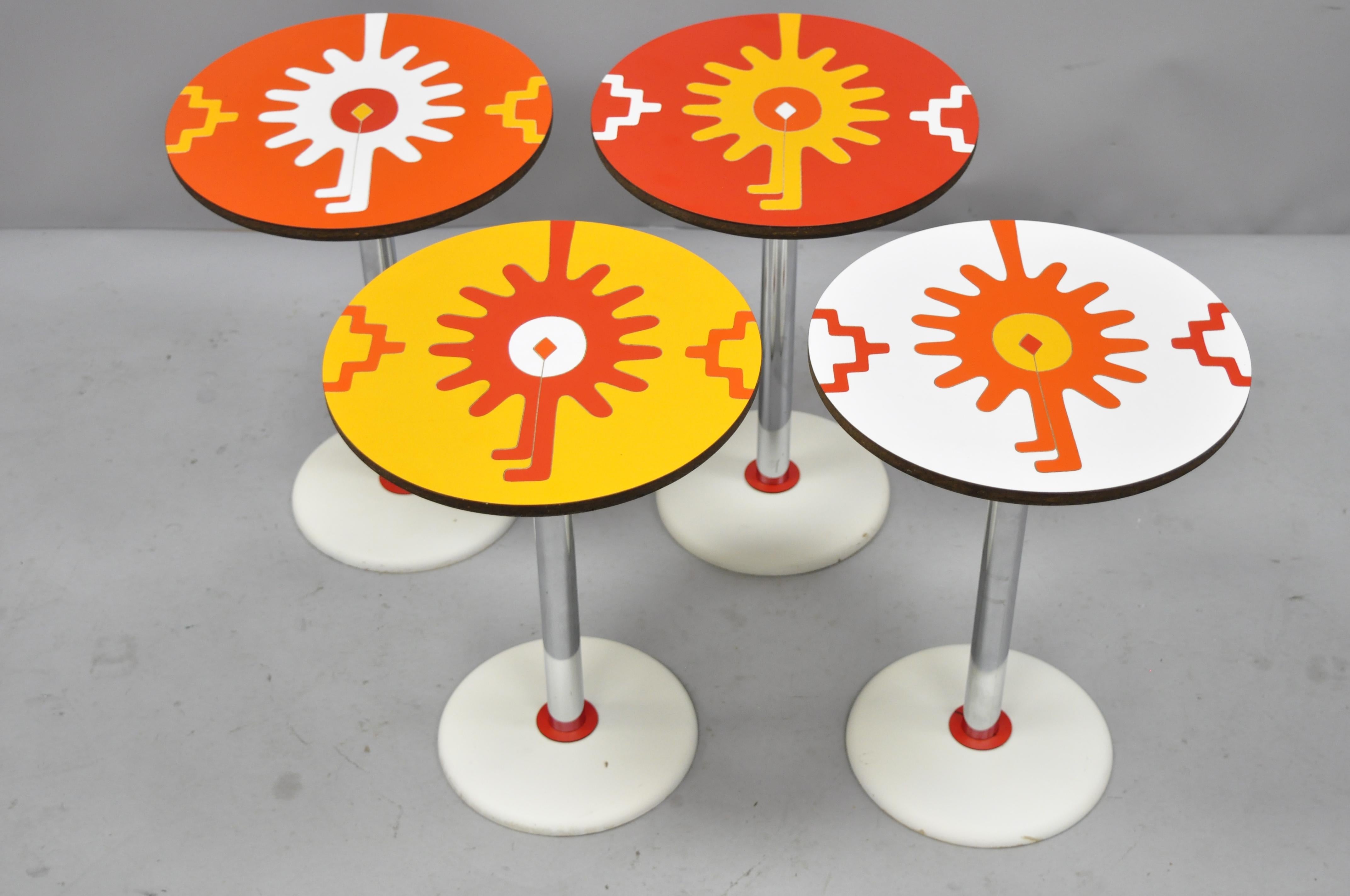 Set of 4 vintage orange yellow white geometric pattern round side tables by R. Johnson. Listing features (4) tables, colorful laminated tops, chrome column, wooden base, signed 