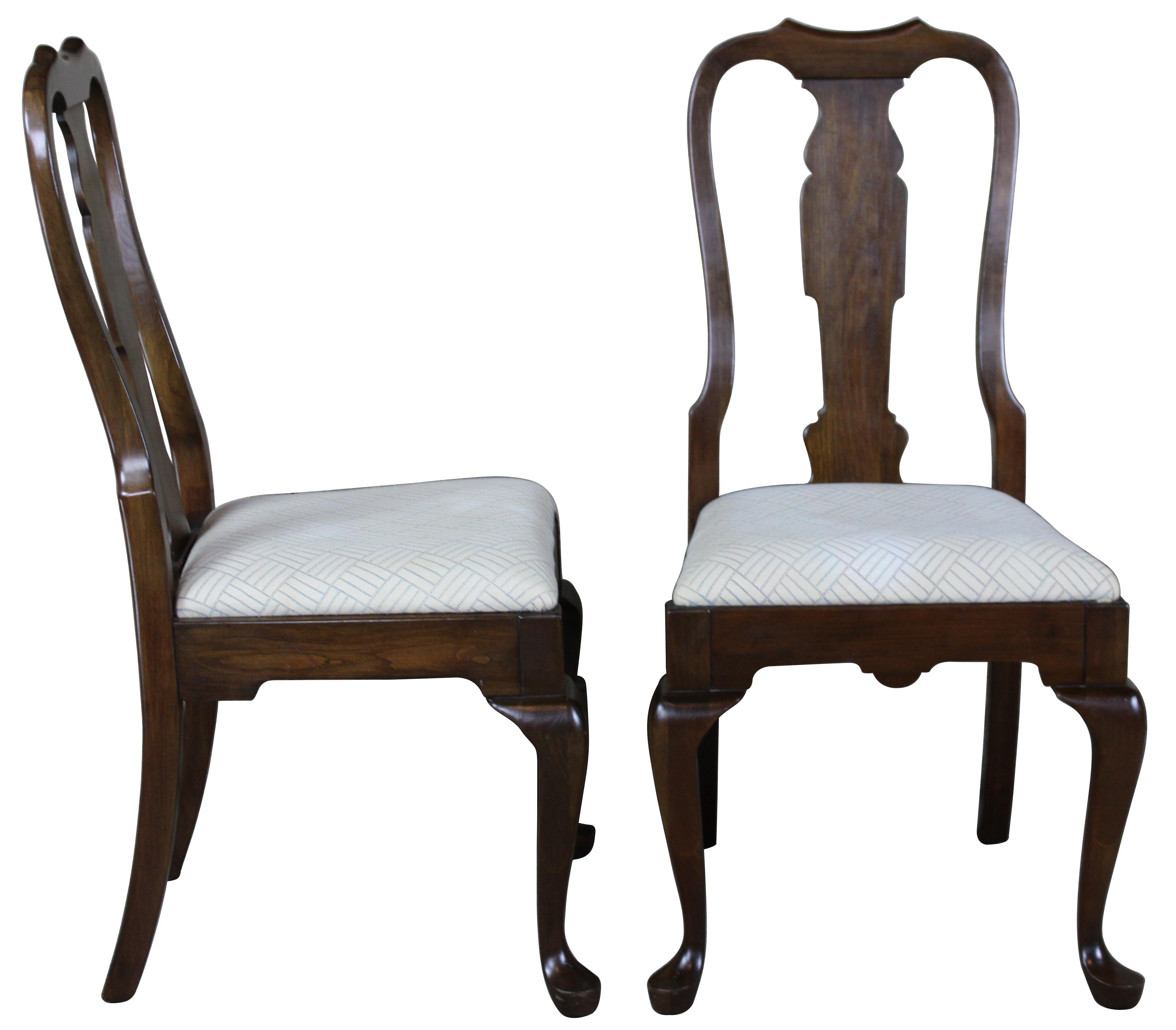 4 Pennsylvania House Independence hall dining chairs, circa 1978. Made from solid cherry in Queen Anne styling. Features a curved upper rail over vase shaped splat and cabriole legs. Upholstered in whit with grey geometric design. 11-3109.
  