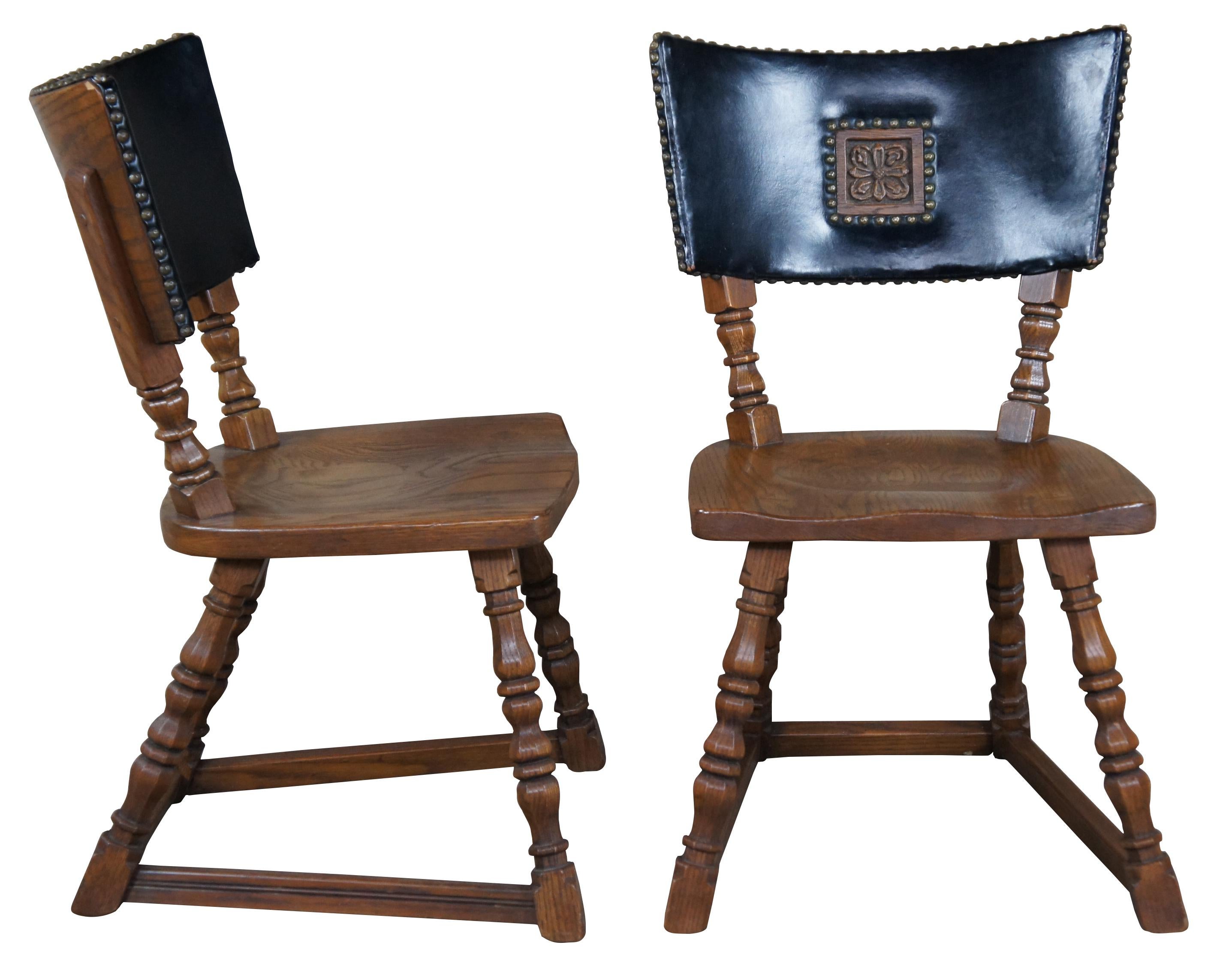 Four vintage Romweber Viking Oak collection side dining chairs. Made of quartersawn oak featuring black leather with carved floral accents and nailhead trim.

Romwebers roots go back to 1879 in Batesville, Indiana. One of the nations oldest case