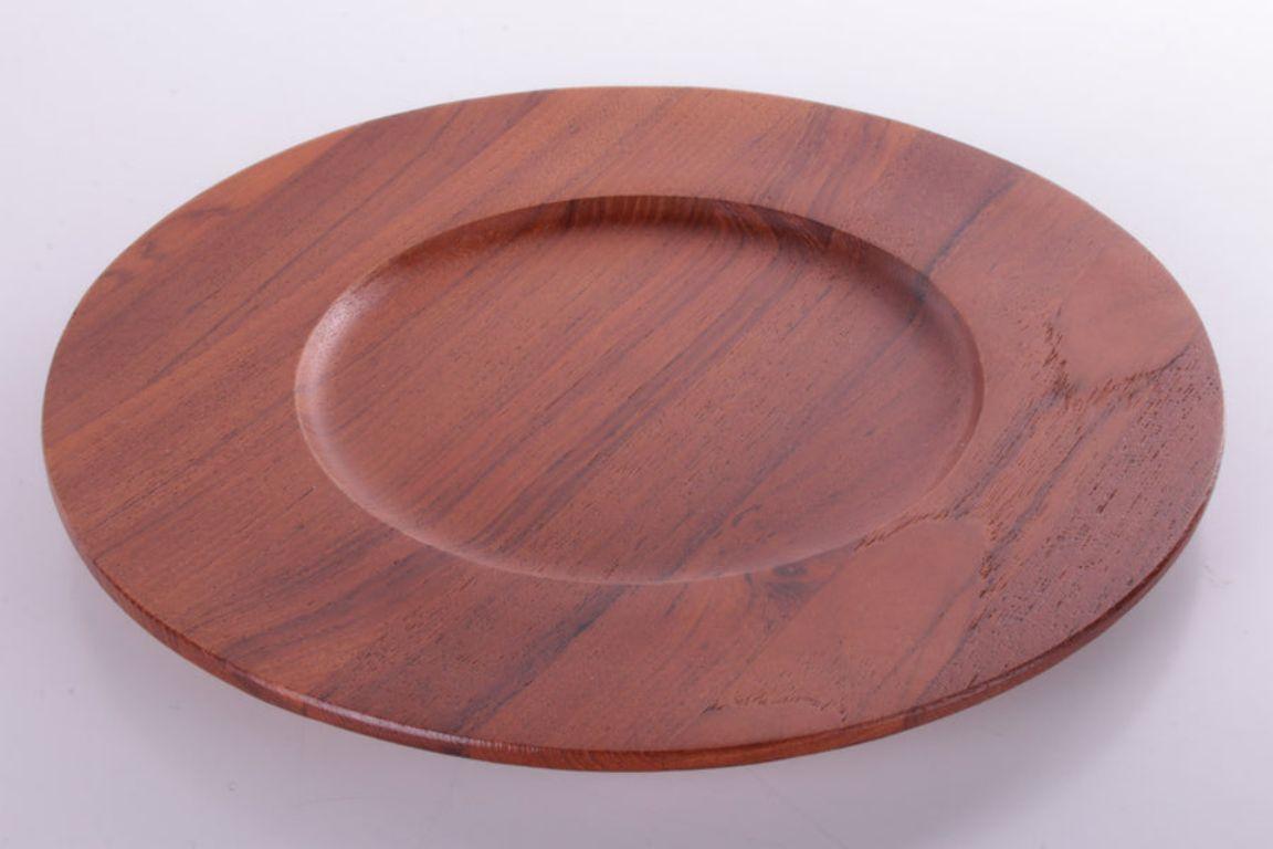 4 Vintage Teak Wooden Underplates by the Brand Kjeni Denmark
Elegant and chic teak plates are something different.

It makes us very happy! Ideal as a breakfast plate or use them as tableware for a special dinner.

This is a set of 4 not for sale